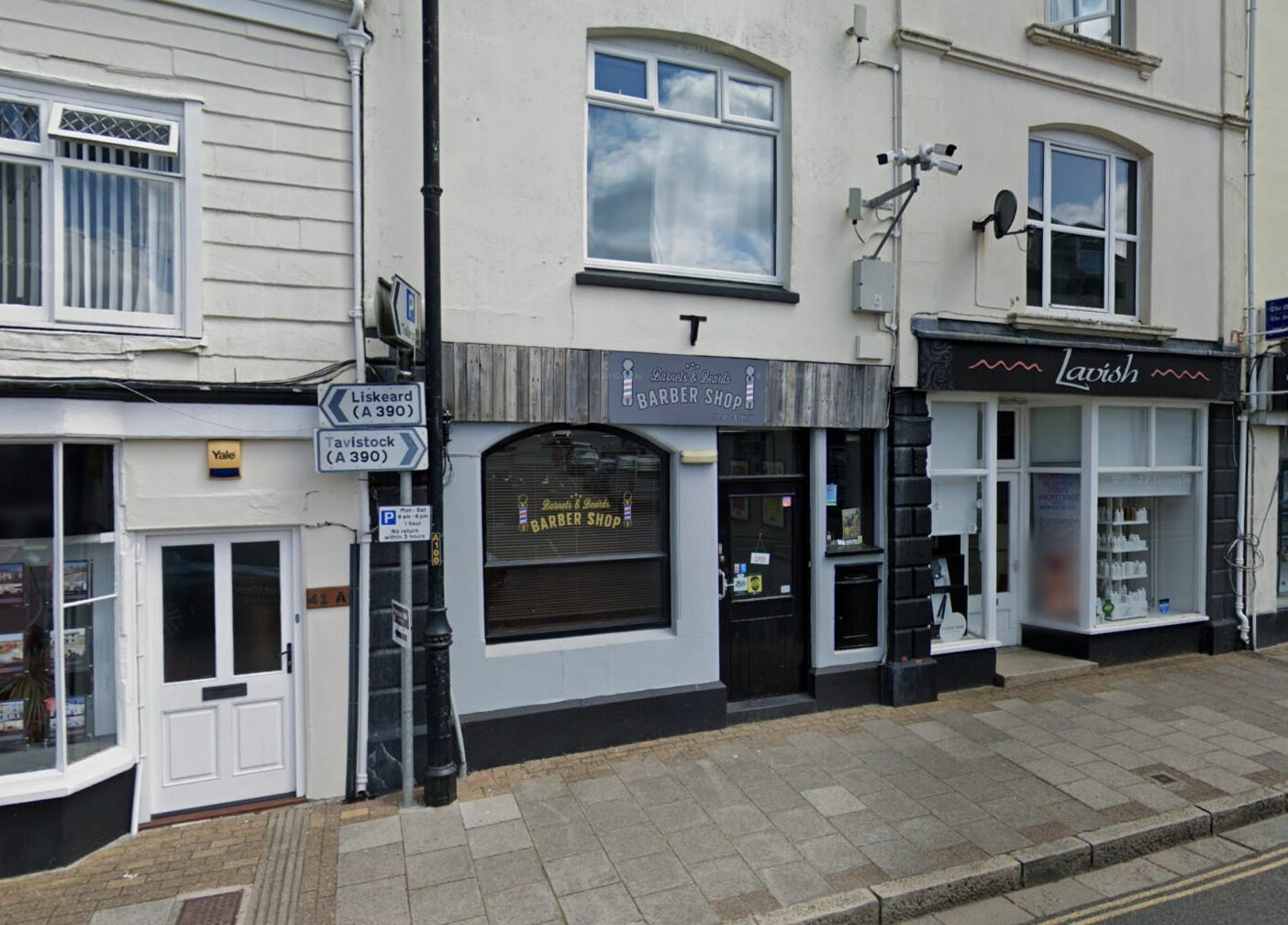 Barnets and Beards Barbershop facade in Callington, England, GB, showcasing its classic exterior.