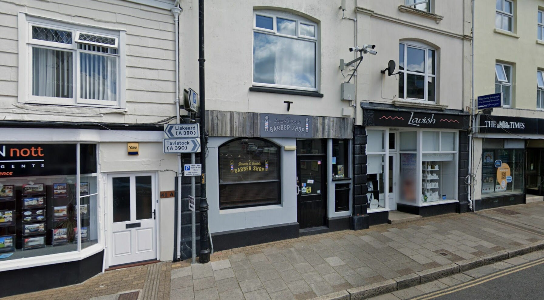 Barnets and Beards Barbershop facade in Callington, England, GB, showcasing its classic exterior.
