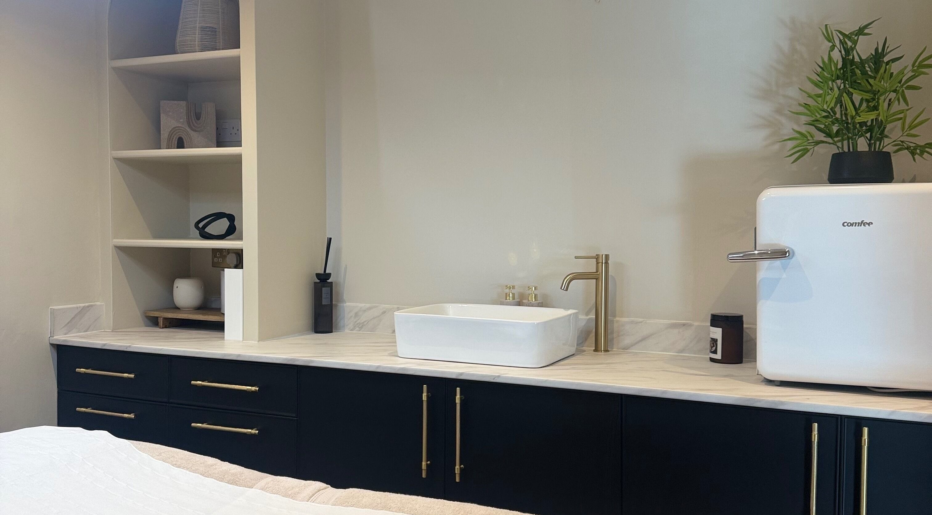 Elegant interior at Chontelle Taylor Aesthetics, Portsmouth, England, GB, featuring a sink and decor.