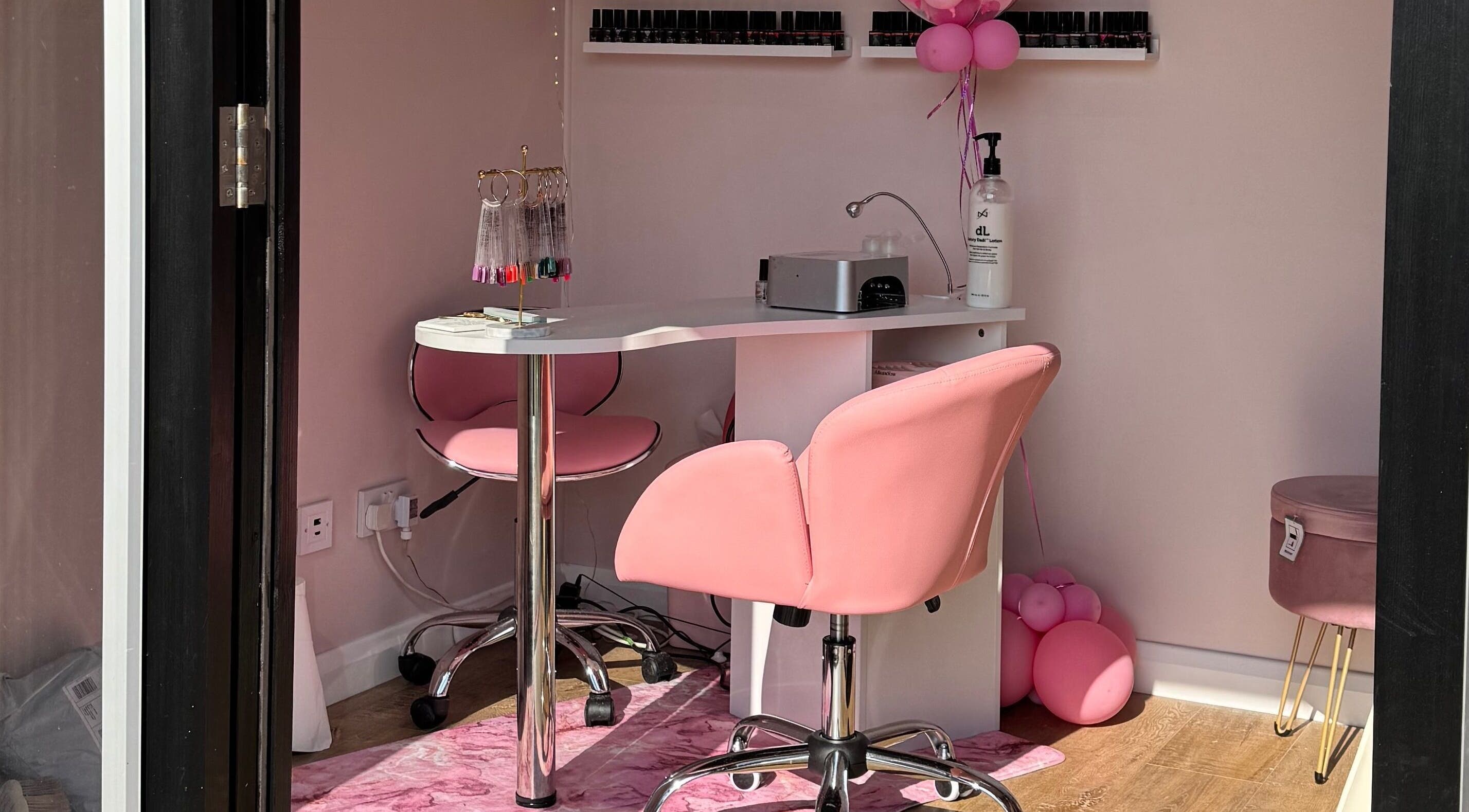 Chic pink manicure station at The Nest, Stoke-on-Trent, England, GB, featuring modern salon equipment.