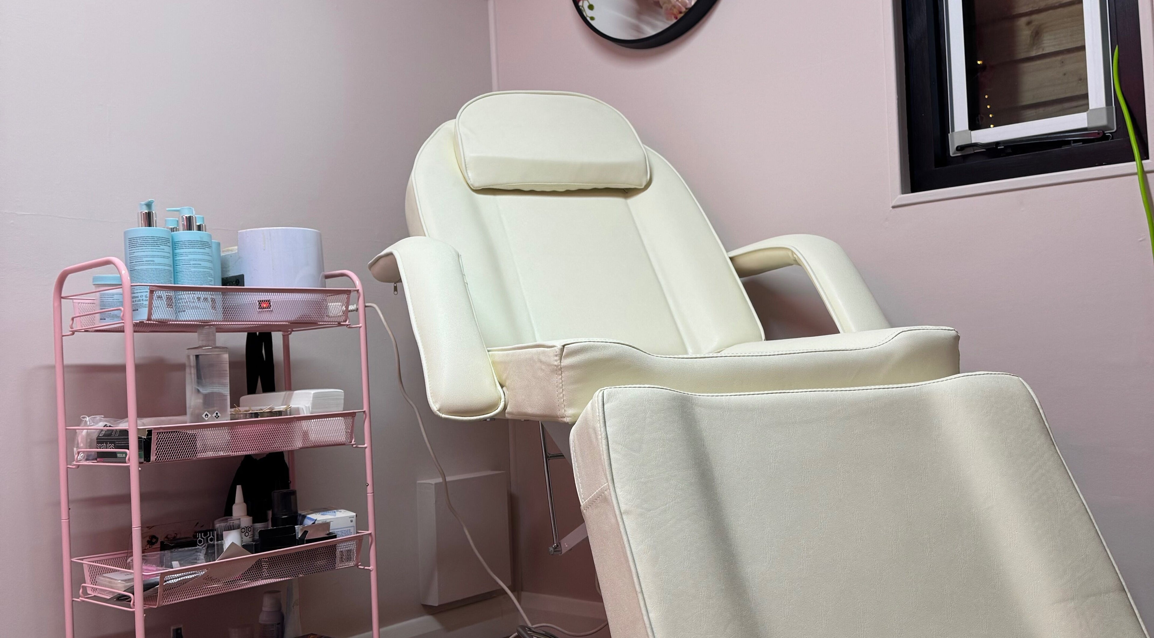 Elegant spa chair and skincare products at The Nest, Stoke-on-Trent, England, GB. A serene wellness space.