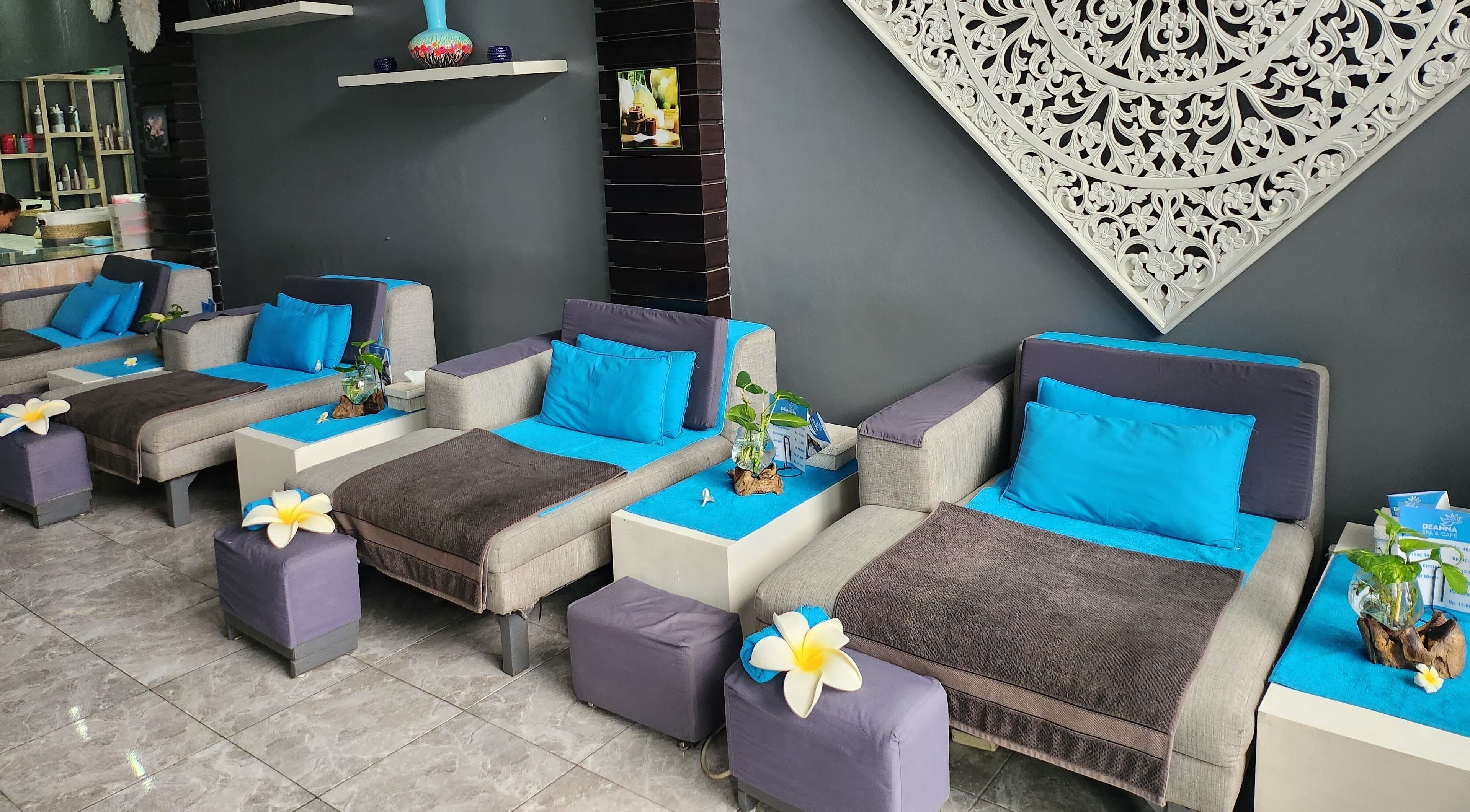 Relaxing lounge chairs at Deanna Spa & Cafe, Bali, Bali, ID, inviting a soothing ambiance with elegant decor.