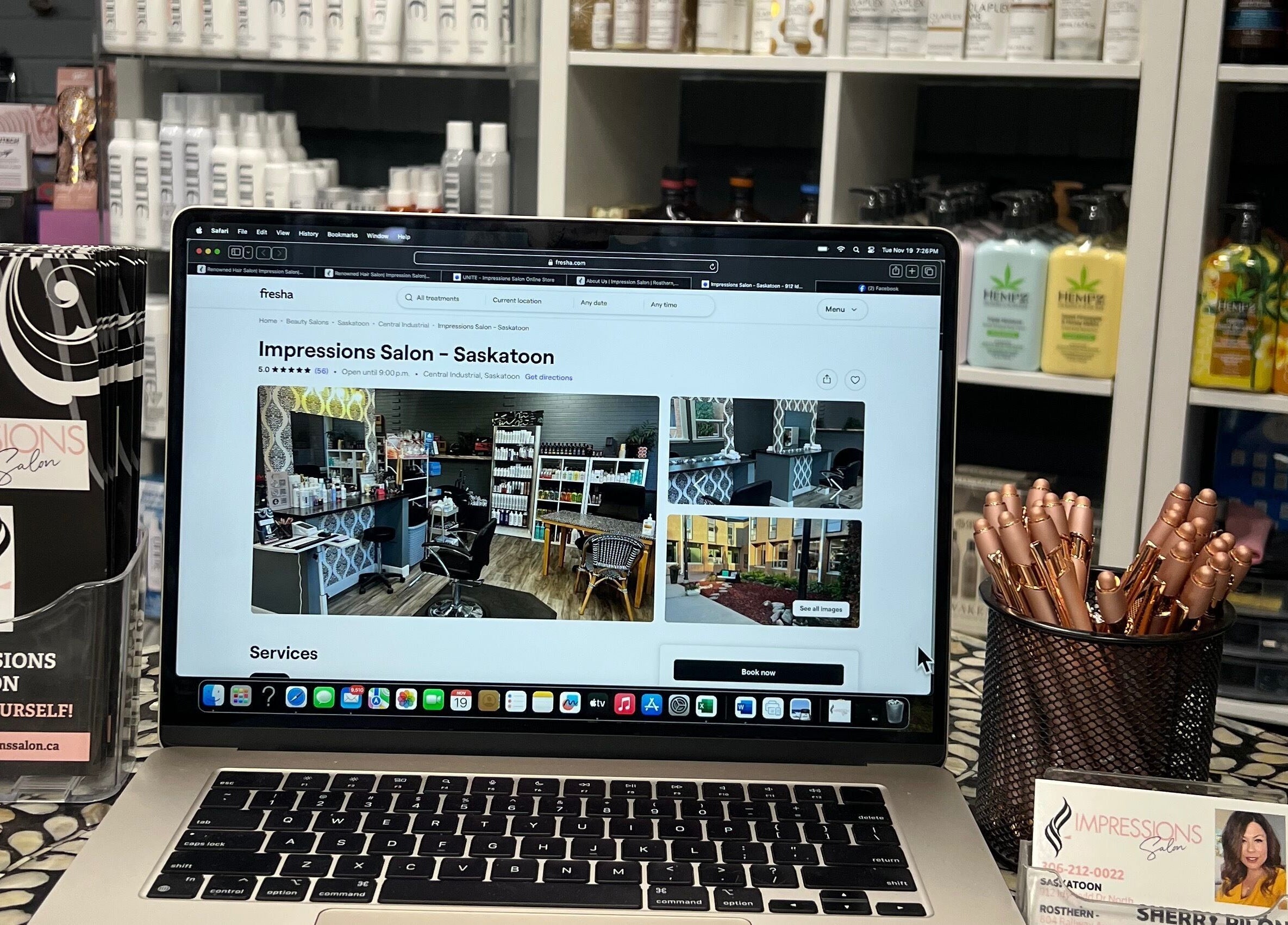 Laptop displaying Impressions Salon - Saskatoon's website with products in Saskatoon, Saskatchewan, CA.