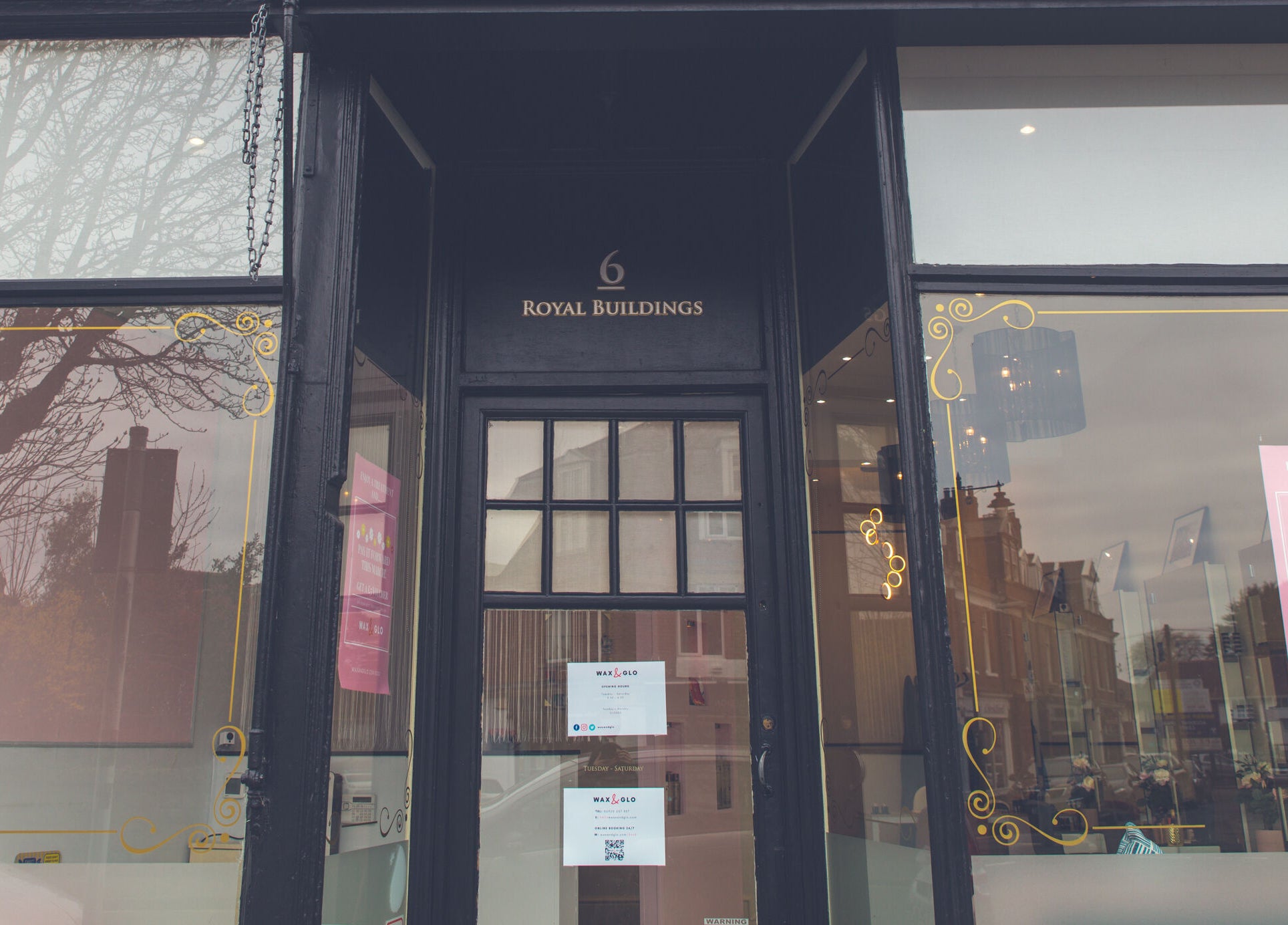 Front entrance of WAX & GLO at Penarth, Wales, GB showcasing its elegant and welcoming exterior.