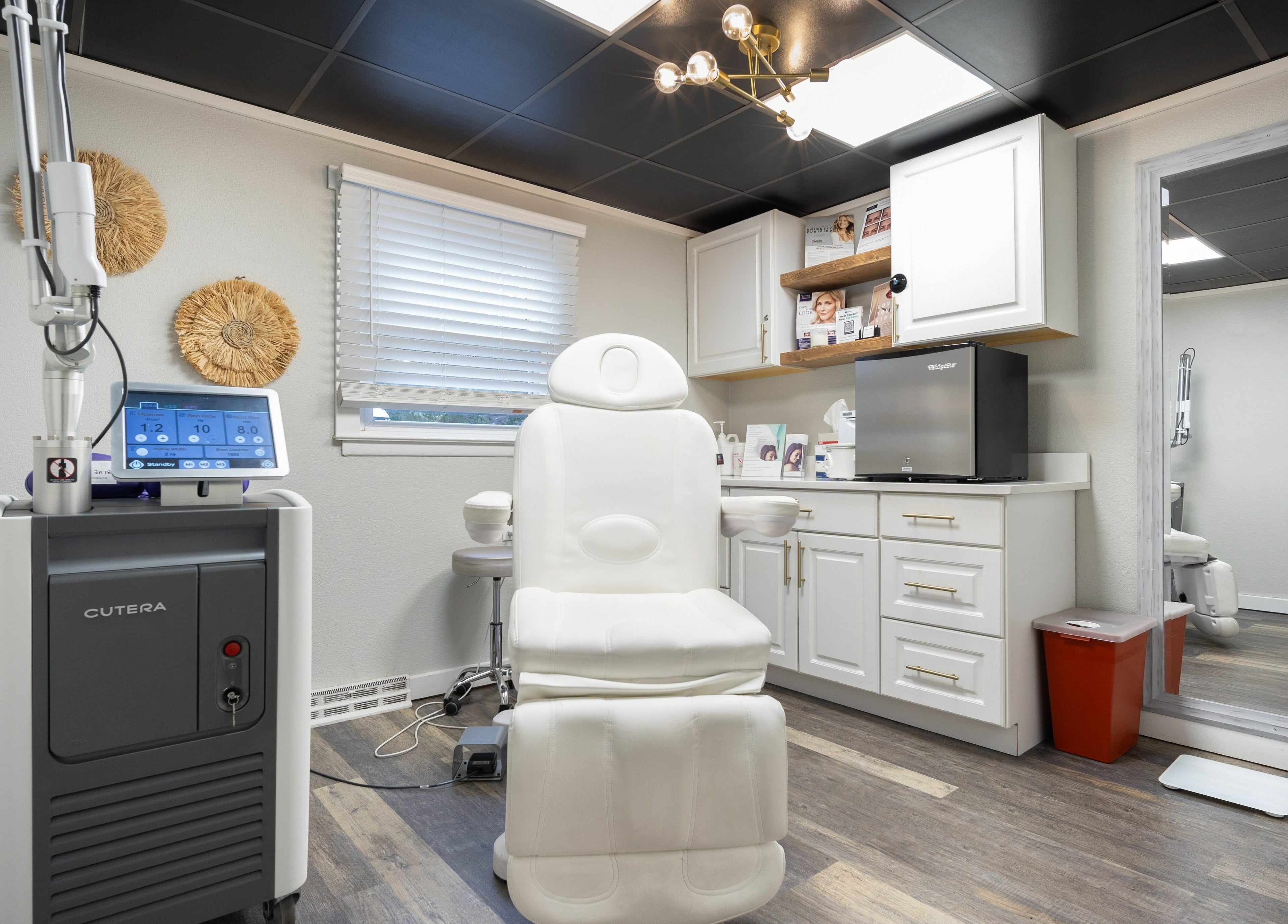 Modern treatment room at Simply Fresh Aesthetics, Miller Place, New York, US with sleek design and advanced equipment.