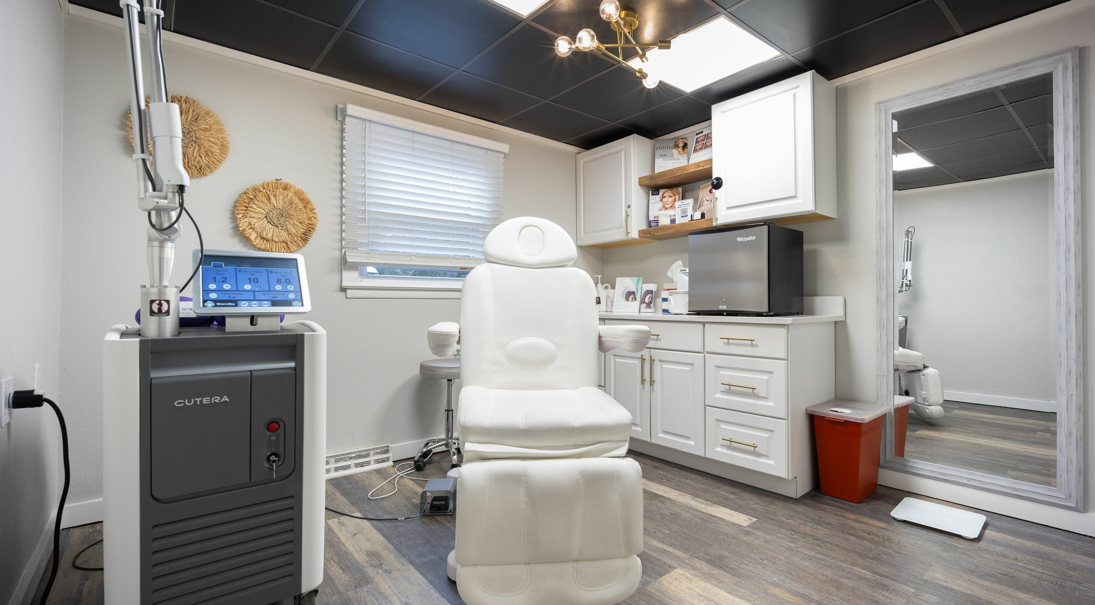 Modern treatment room at Simply Fresh Aesthetics, Miller Place, New York, US with sleek design and advanced equipment.