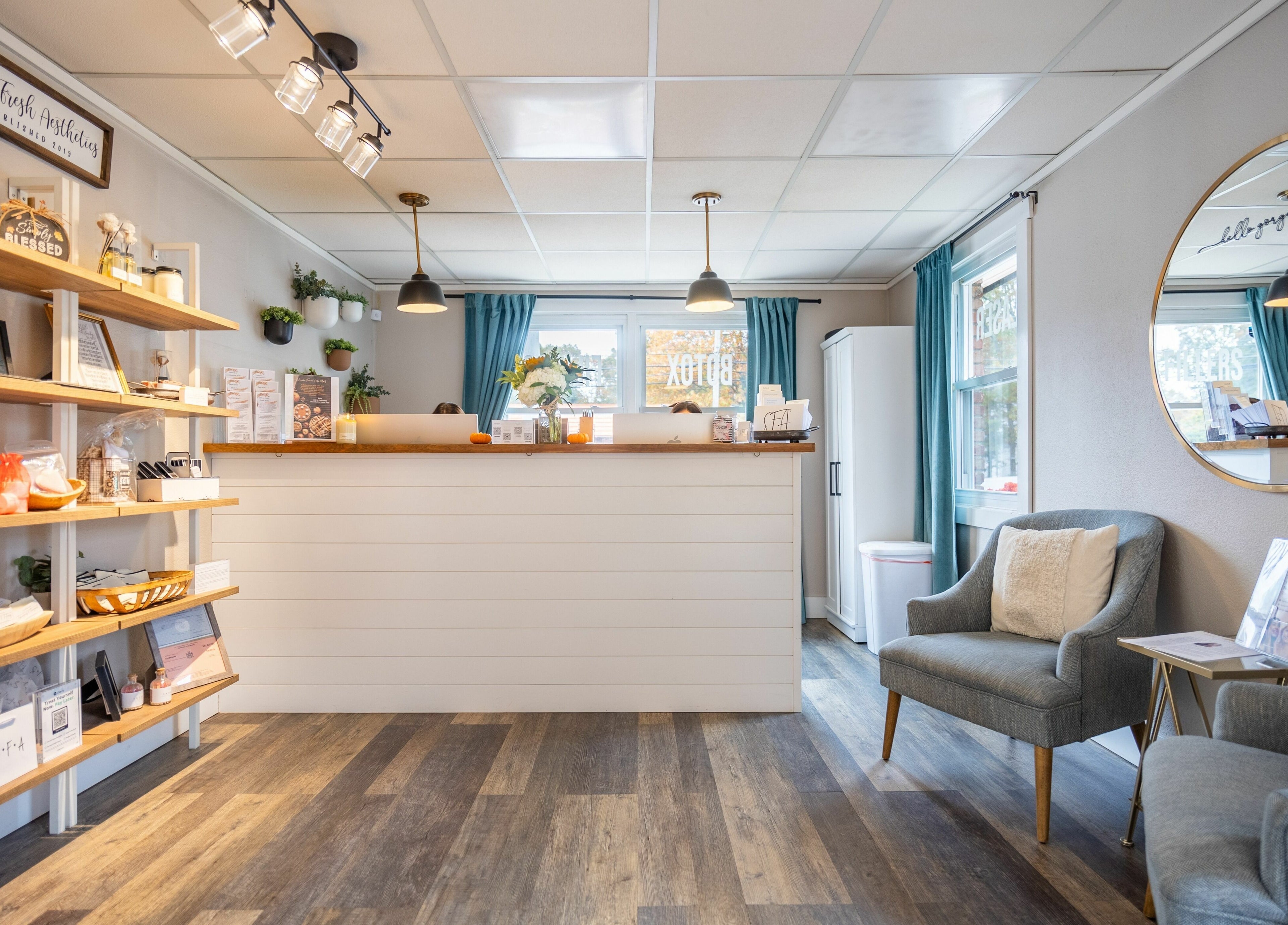 Simply Fresh Aesthetics' welcoming lobby in Miller Place, New York, US, with elegant decor and seating.