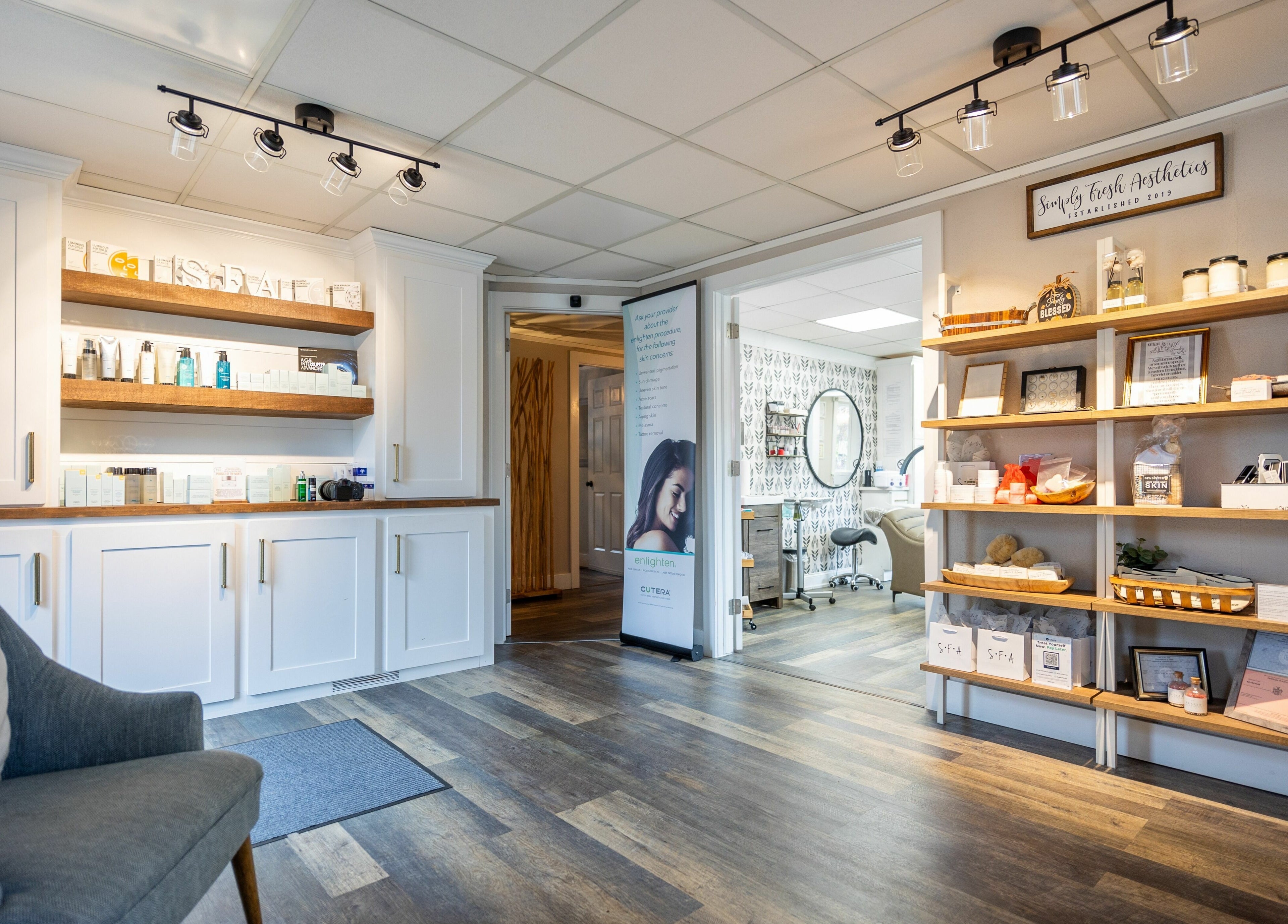 Elegant interior of Simply Fresh Aesthetics in Miller Place, New York, US showcasing modern design and skincare products.