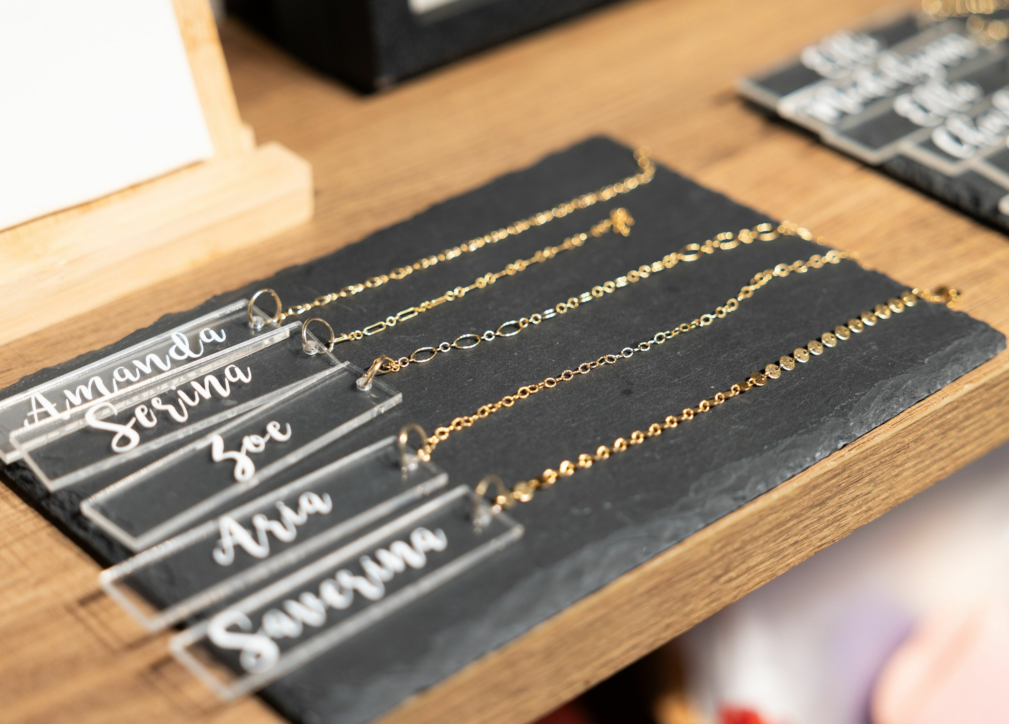 Custom name necklaces displayed at Simply Fresh Aesthetics, Miller Place, New York, US.