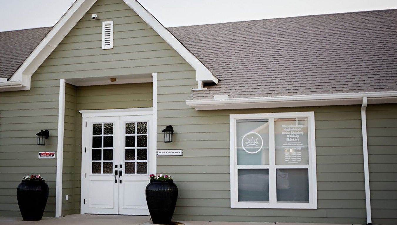 Elegant entrance of The Brow Shaping Queen in Frisco, Texas, US, showcasing modern exterior design.
