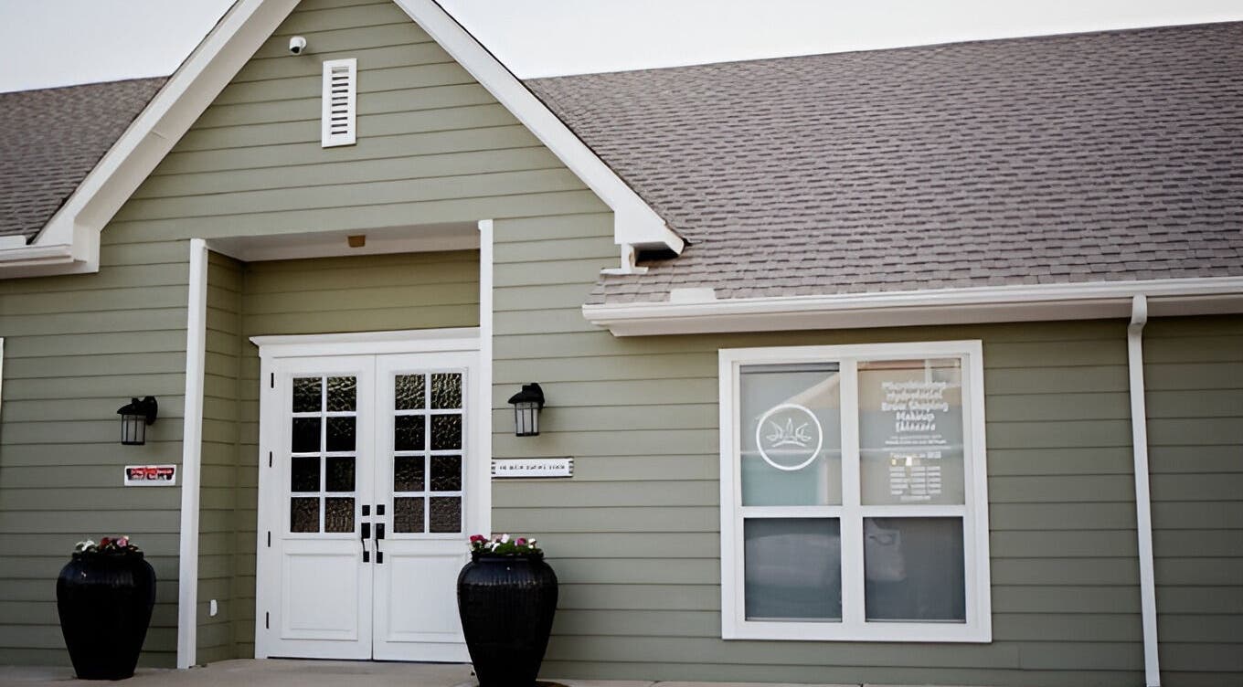 Elegant entrance of The Brow Shaping Queen in Frisco, Texas, US, showcasing modern exterior design.