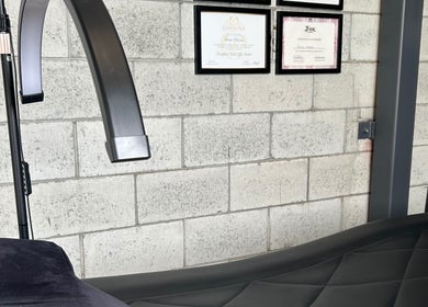 BriLash Lashes and Brows in Waikanae, Wellington, NZ showcases impressive certification wall.