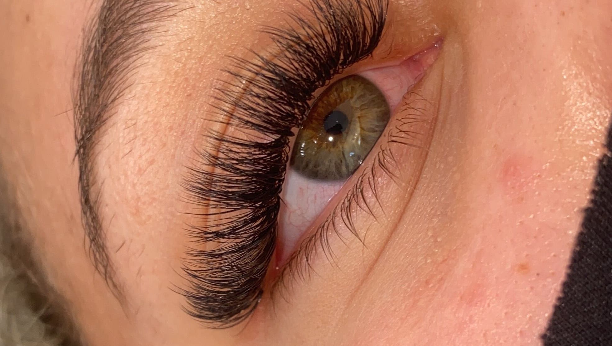 Close-up of professionally applied eyelash extensions at AW Beauty, Pembroke, Wales, GB.
