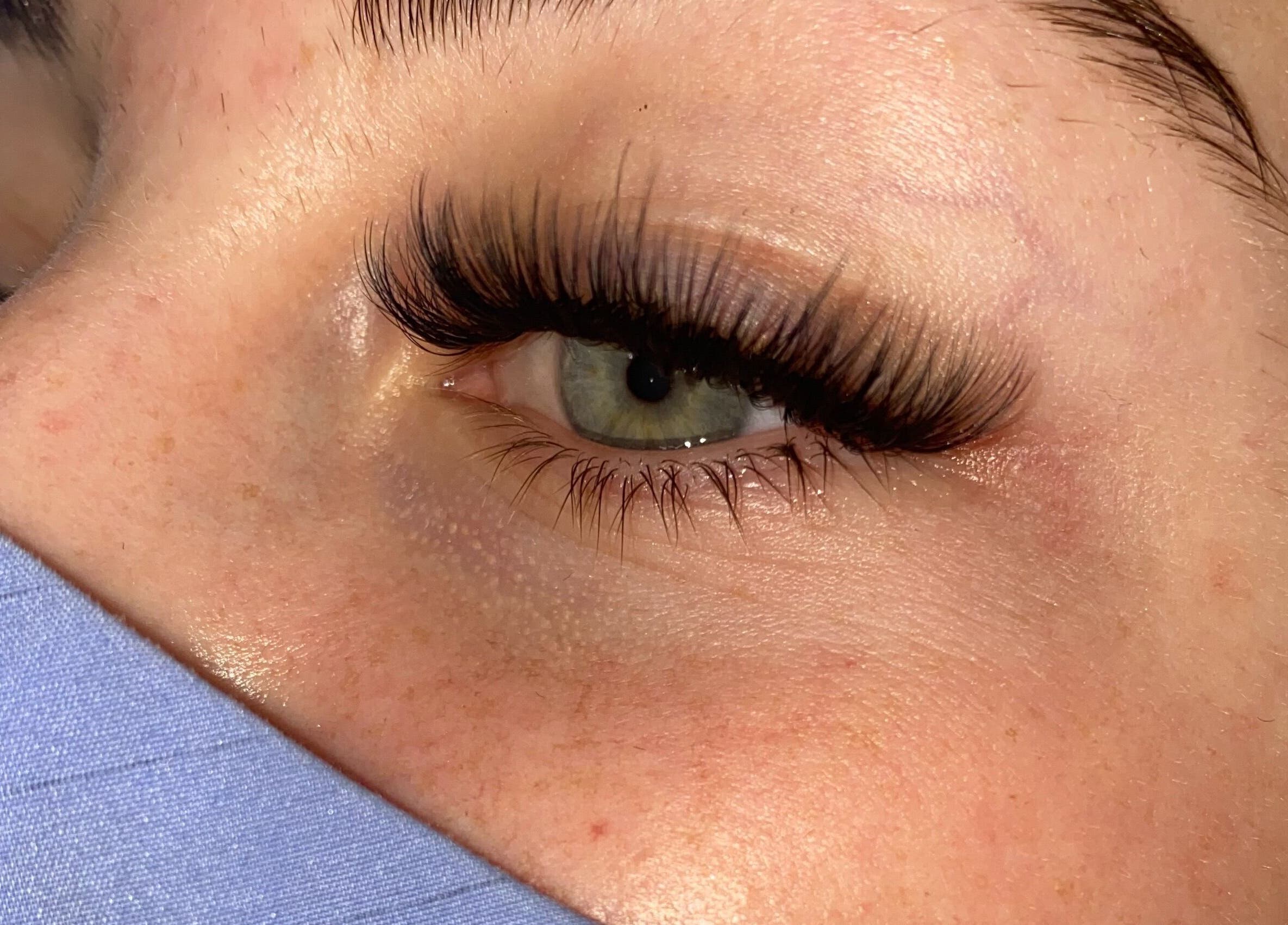 Close-up of elegant eyelash extensions at AW Beauty, Pembroke, Wales, GB, enhancing natural beauty.