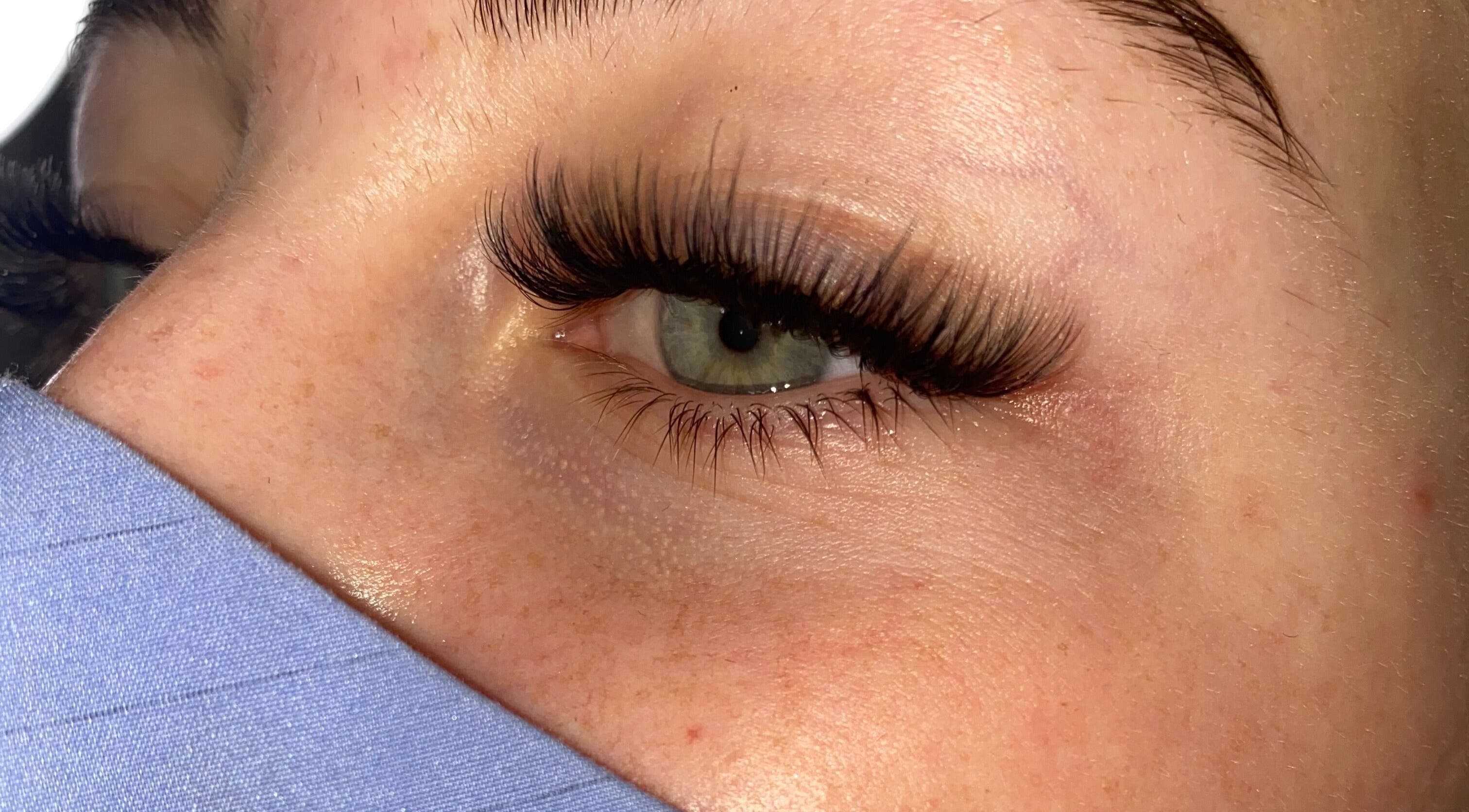 Close-up of elegant eyelash extensions at AW Beauty, Pembroke, Wales, GB, enhancing natural beauty.
