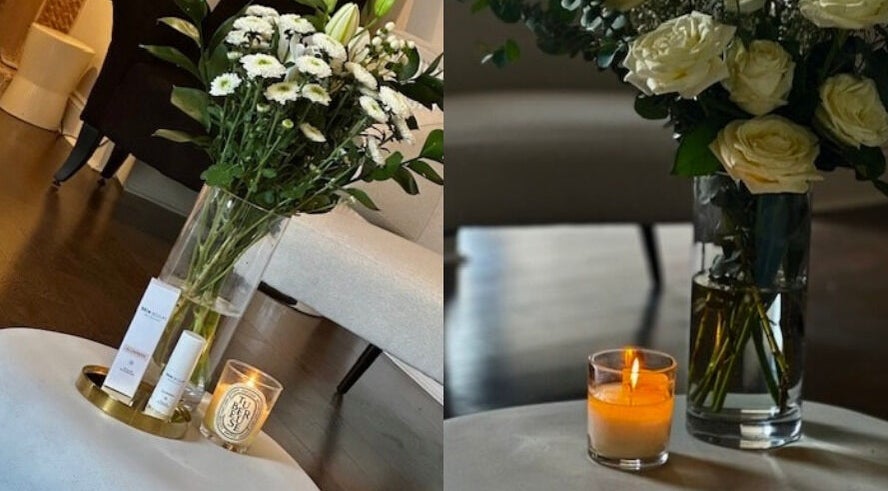 Elegant floral display and candle at Dr Heather Muir Aesthetics & Skin, Uddingston, Scotland, GB.