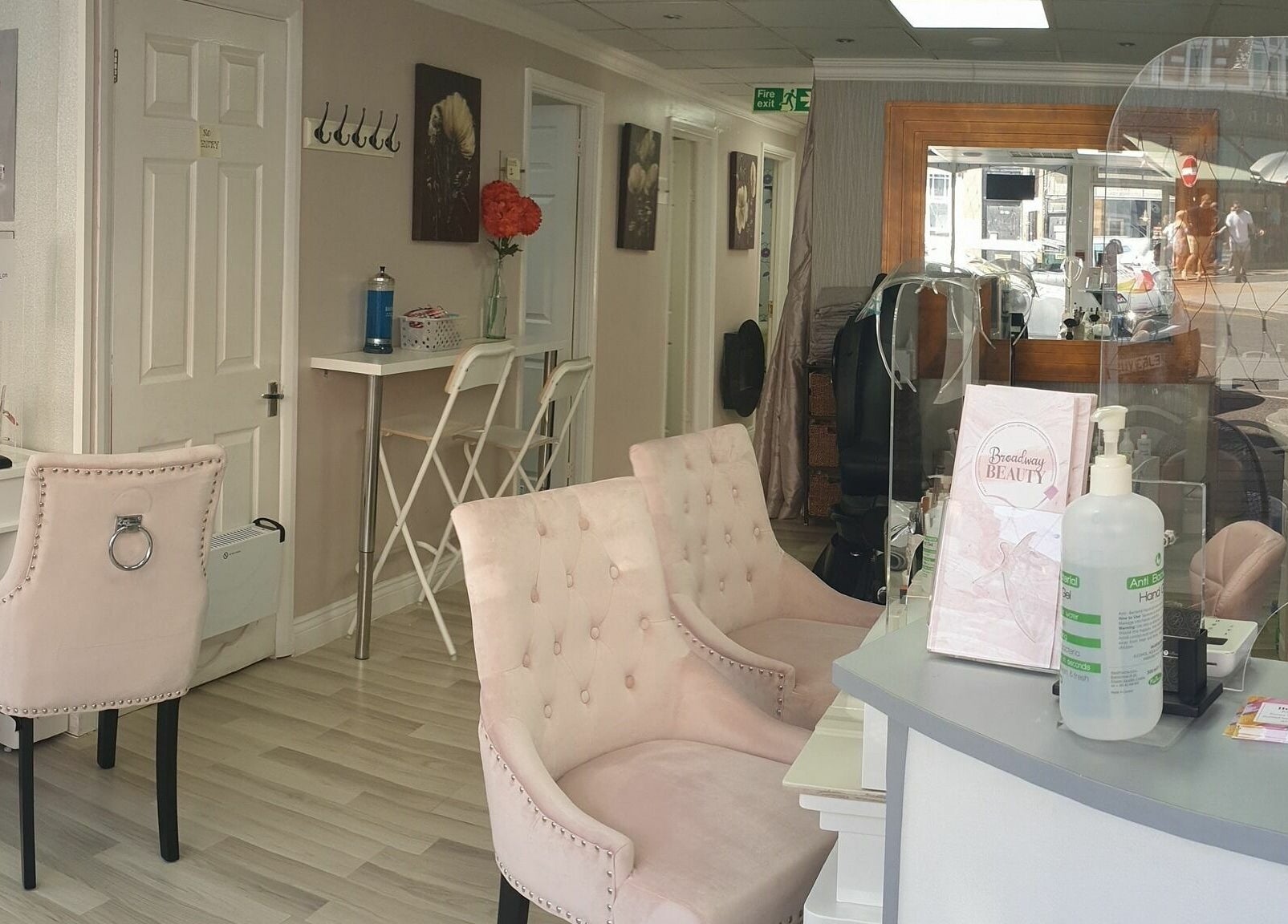 Chic interior of Broadway Beauty, Southend-on-Sea, England, with plush seating and elegant decor.