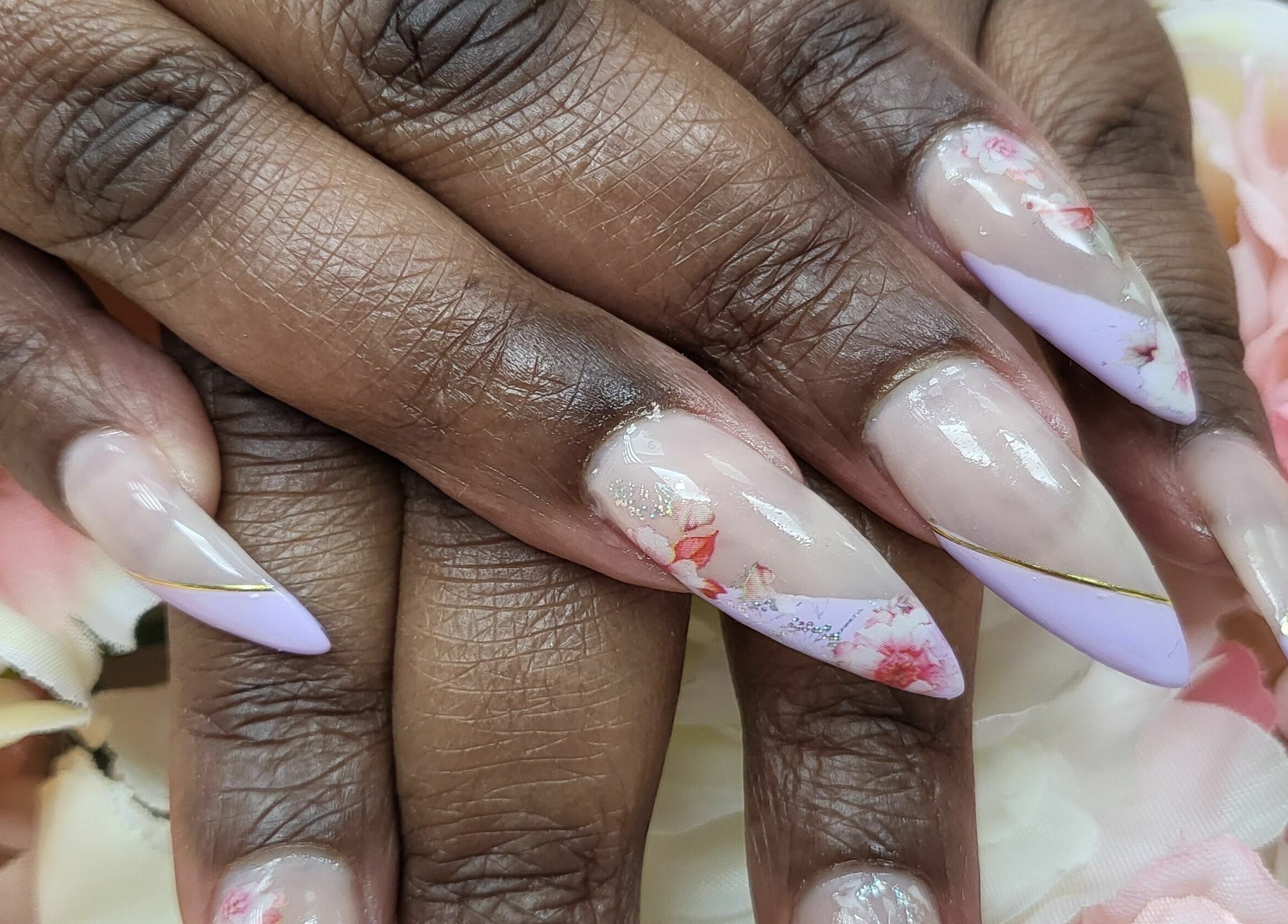 Stylish floral nail art at Broadway Beauty, Southend-on-Sea, England, GB.