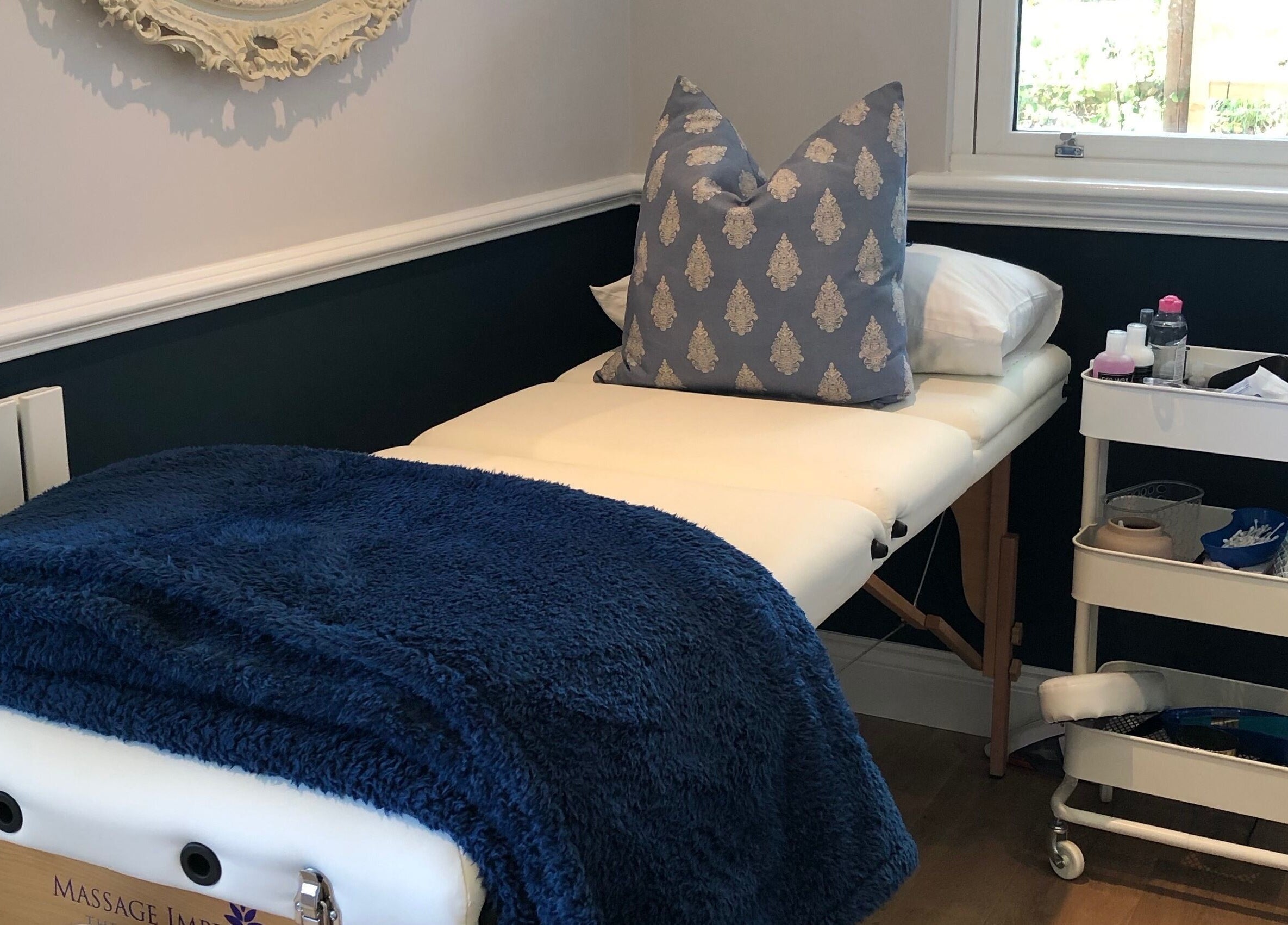 Massage table with blue blanket at Fieldwaylife Beauty, Berkhamsted, England, GB.