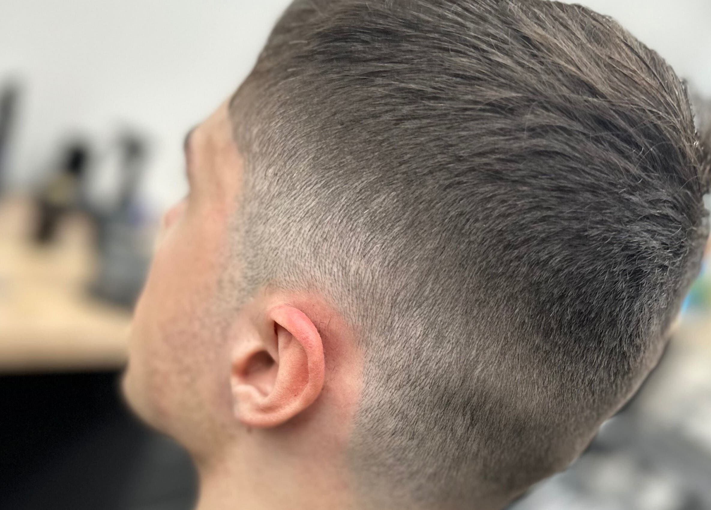 Close-up of a modern fade haircut at Sauchiehall Barbers, Glasgow, Scotland, GB.