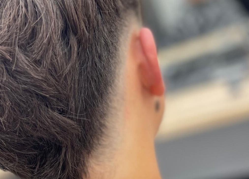 Close-up of a textured haircut at Sauchiehall Barbers, Glasgow, Scotland, GB focusing on neat undercut styling.