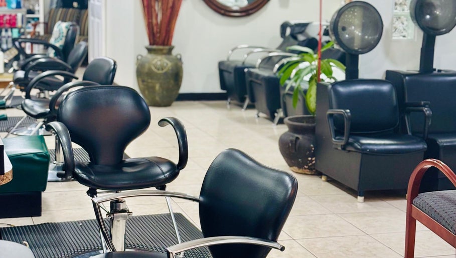 Modern salon chairs at Arelis Beauty Salon in Orlando, Florida, US offer a sleek, relaxing environment for clients.