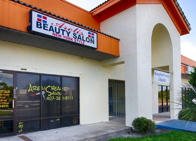 Arelis Beauty Salon entrance with vibrant signage in Orlando, Florida, US.