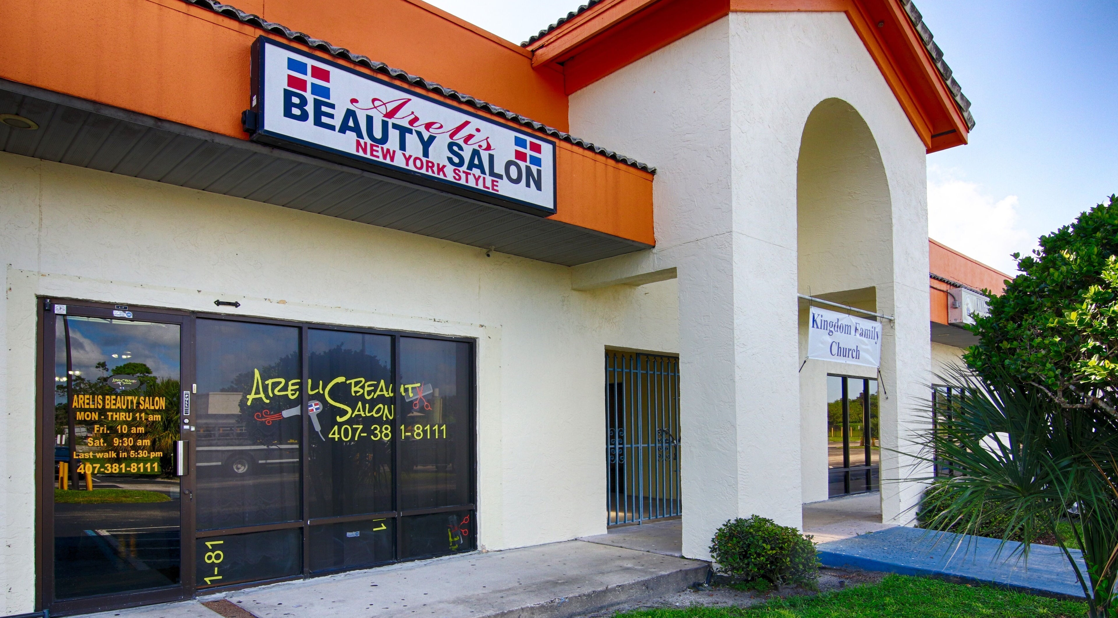 Front entrance of Arelis Beauty Salon in Orlando, Florida, US showcasing its exterior design.