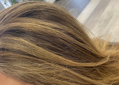 Close-up of styled blonde hair at Salon Femia in Somerville, Massachusetts, US.