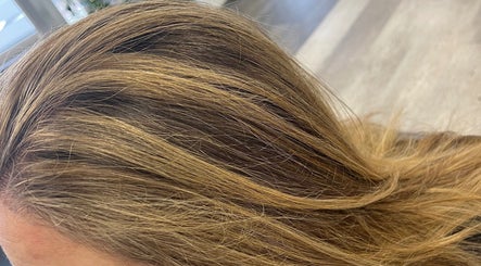 Close-up of styled blonde hair at Salon Femia in Somerville, Massachusetts, US.
