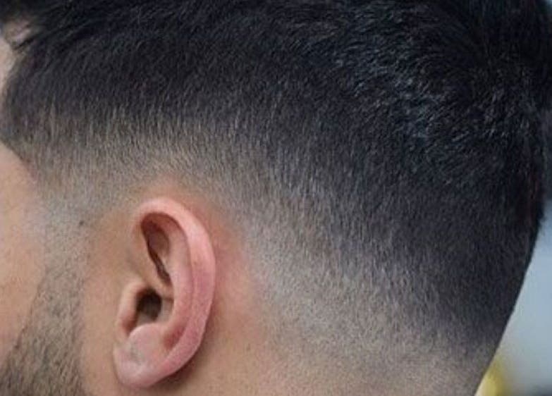 Close-up of a stylish fade haircut at Salon Femia, Somerville, Massachusetts, US.