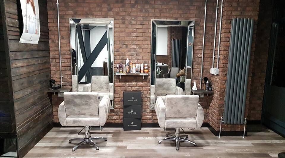 Modern salon chairs and mirrors at Prestige Hair Studio, Weston-super-Mare, England, GB.