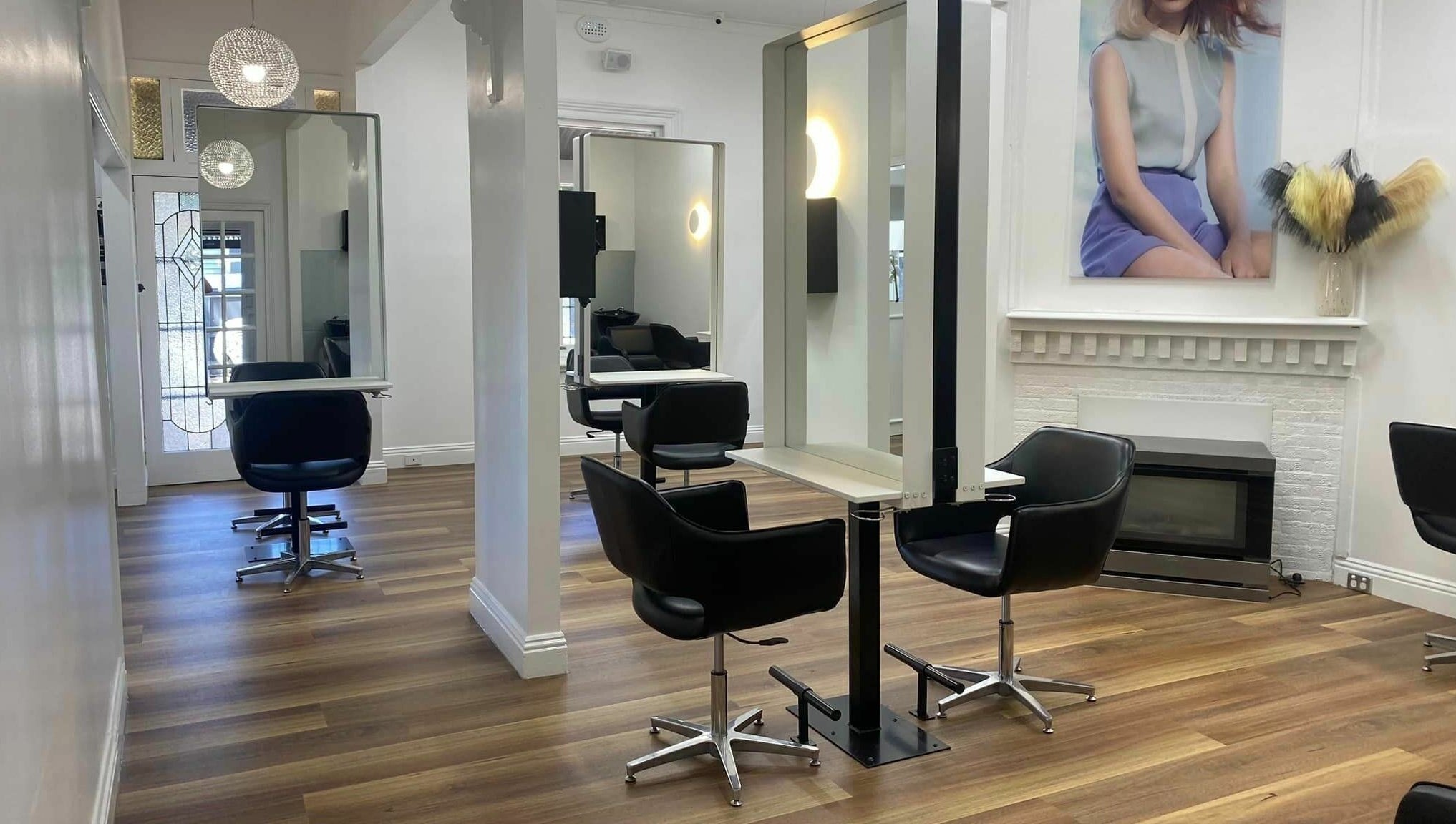 Elegant interior of Salon Hype in Bendigo, VIC, AU featuring modern styling stations and chic decor.