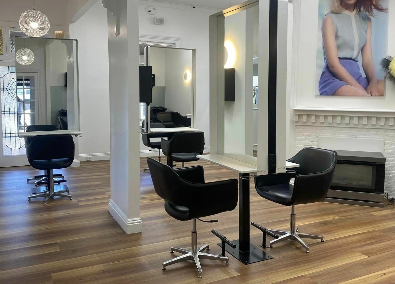 Elegant interior of Salon Hype in Bendigo, VIC, AU featuring modern styling stations and chic decor.