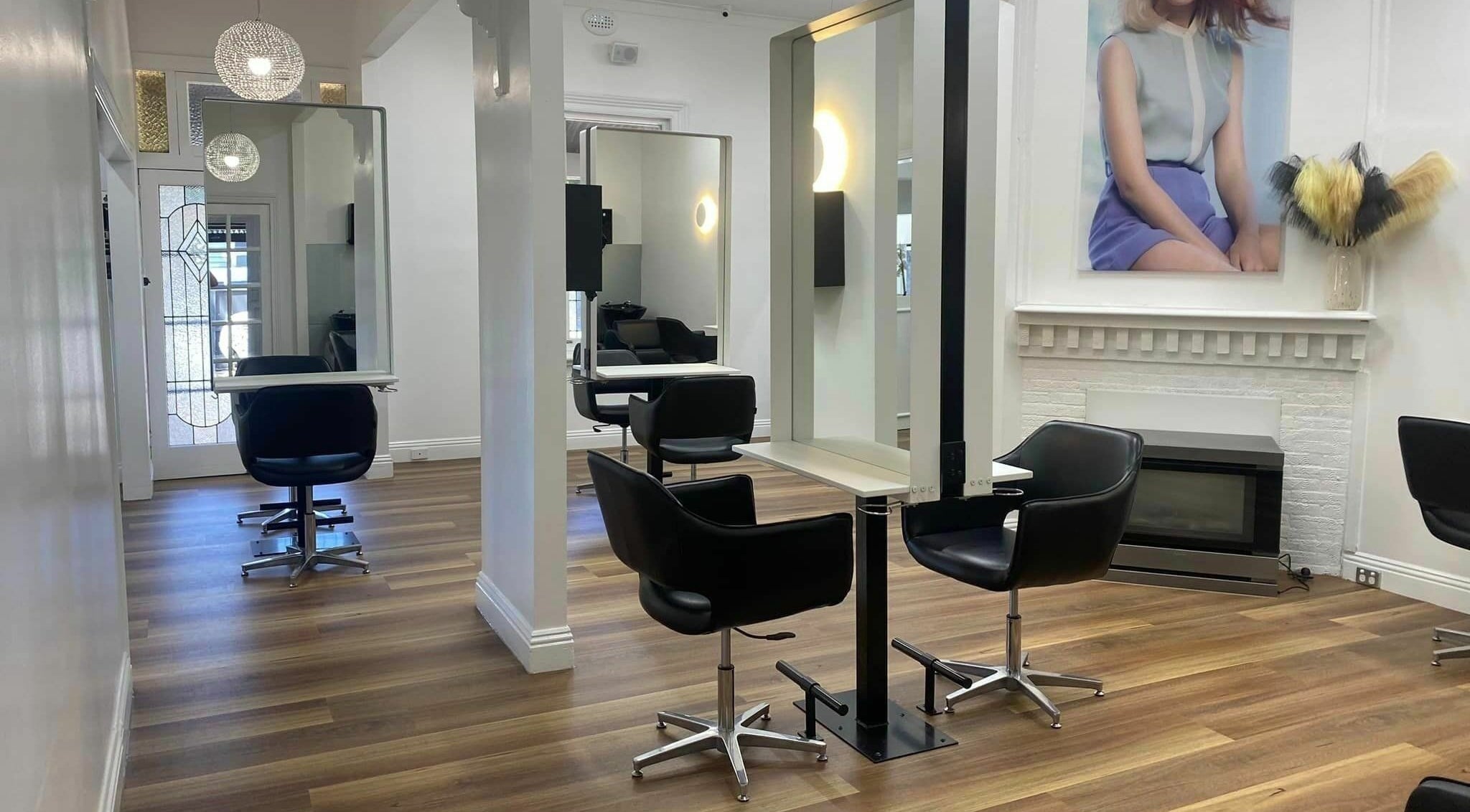 Elegant interior of Salon Hype in Bendigo, VIC, AU featuring modern styling stations and chic decor.