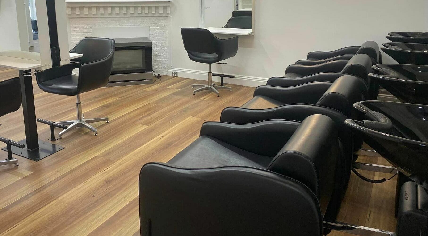 Modern wash stations and chairs at Salon Hype, Bendigo, VIC, AU showcasing stylish comfort.