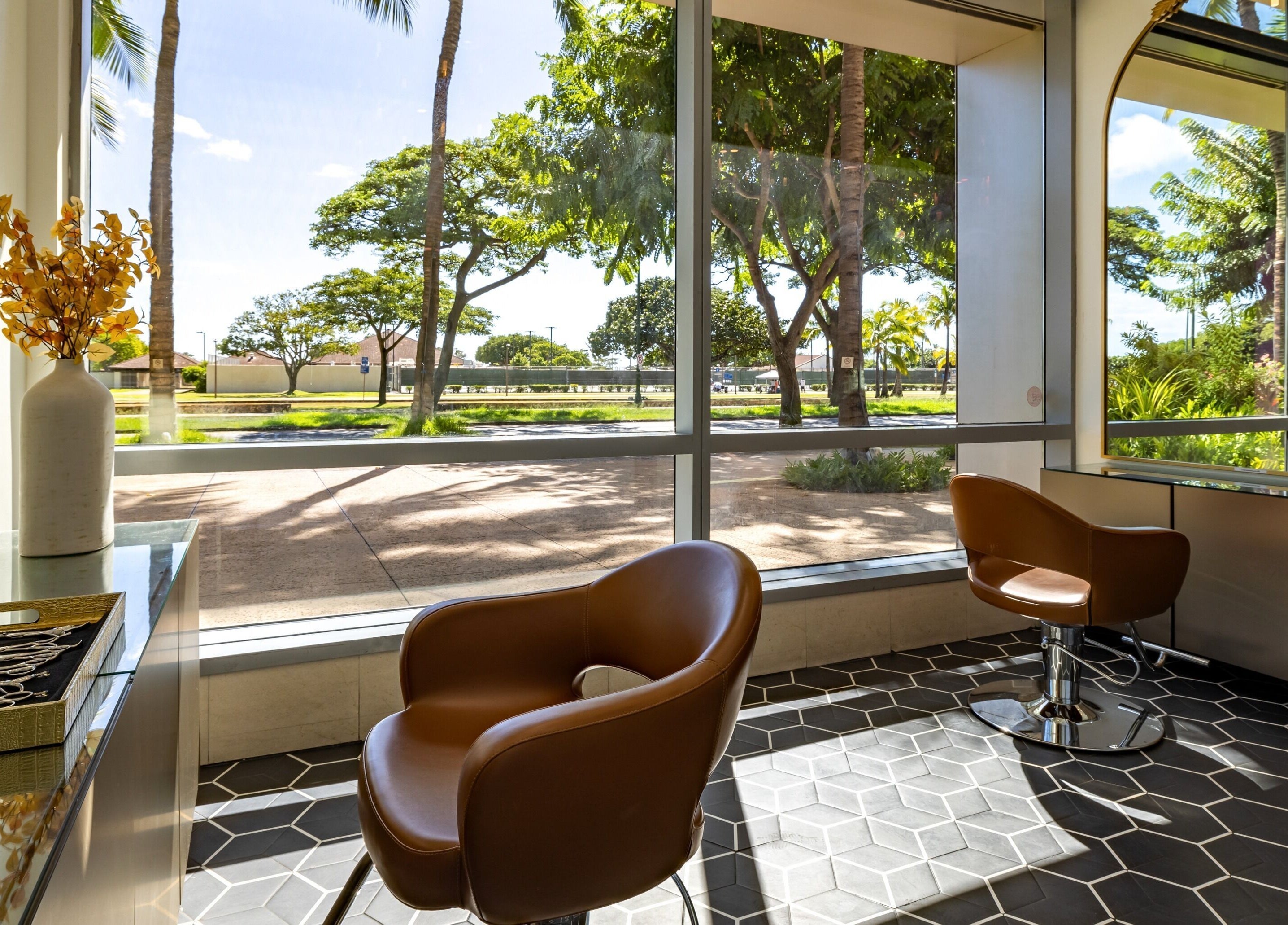 Relaxing interior of Salon Blanc the celebrities salon with lush greenery, Honolulu, Hawaii, US.