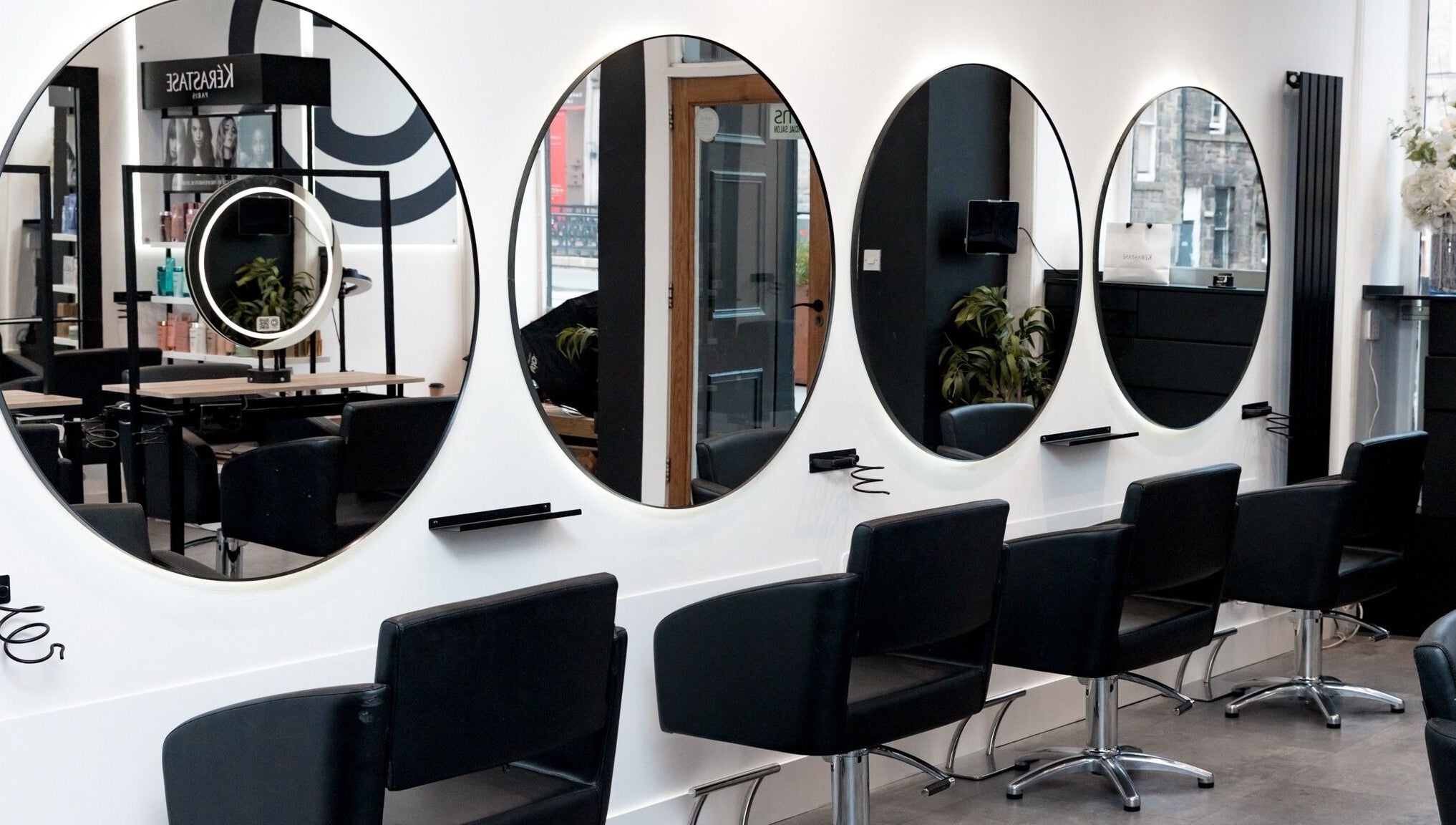 Modern salon mirrors and chairs at Cascal Hair Studio in Edinburgh, Scotland, GB.