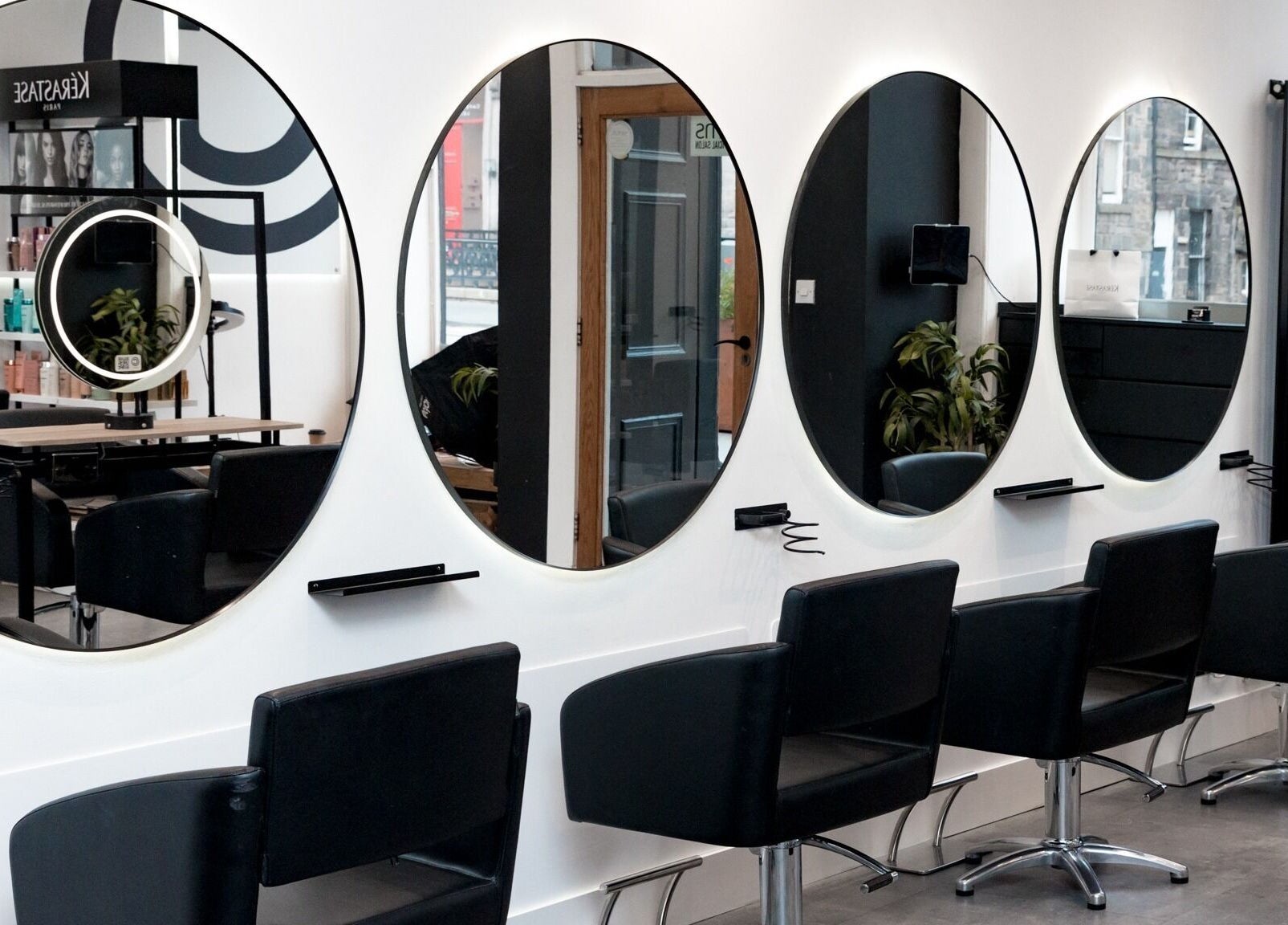 Modern salon mirrors and chairs at Cascal Hair Studio in Edinburgh, Scotland, GB.