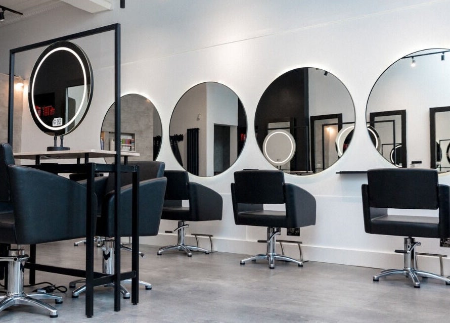 Modern salon chairs and mirrors at Cascal Hair Studio, Edinburgh, Scotland, GB.