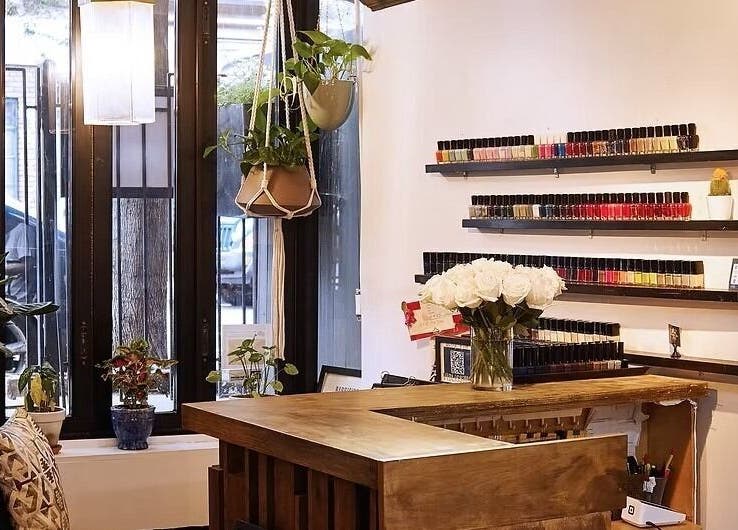 Elegant reception with nail polish display at VIBLiSSiMO Art of Beauty, New York, New York, US.