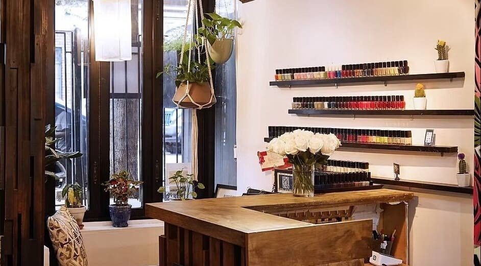 Elegant reception with nail polish display at VIBLiSSiMO Art of Beauty, New York, New York, US.