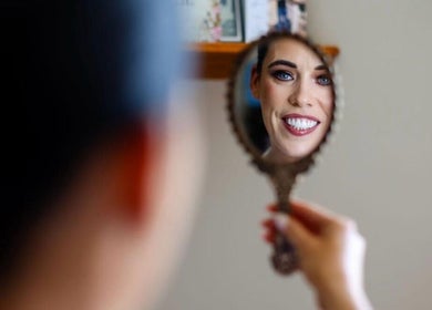 Reflection in vintage mirror at Katie Wrynne Makeup & Beauty, County Galway, enhancing beauty with makeup artistry.