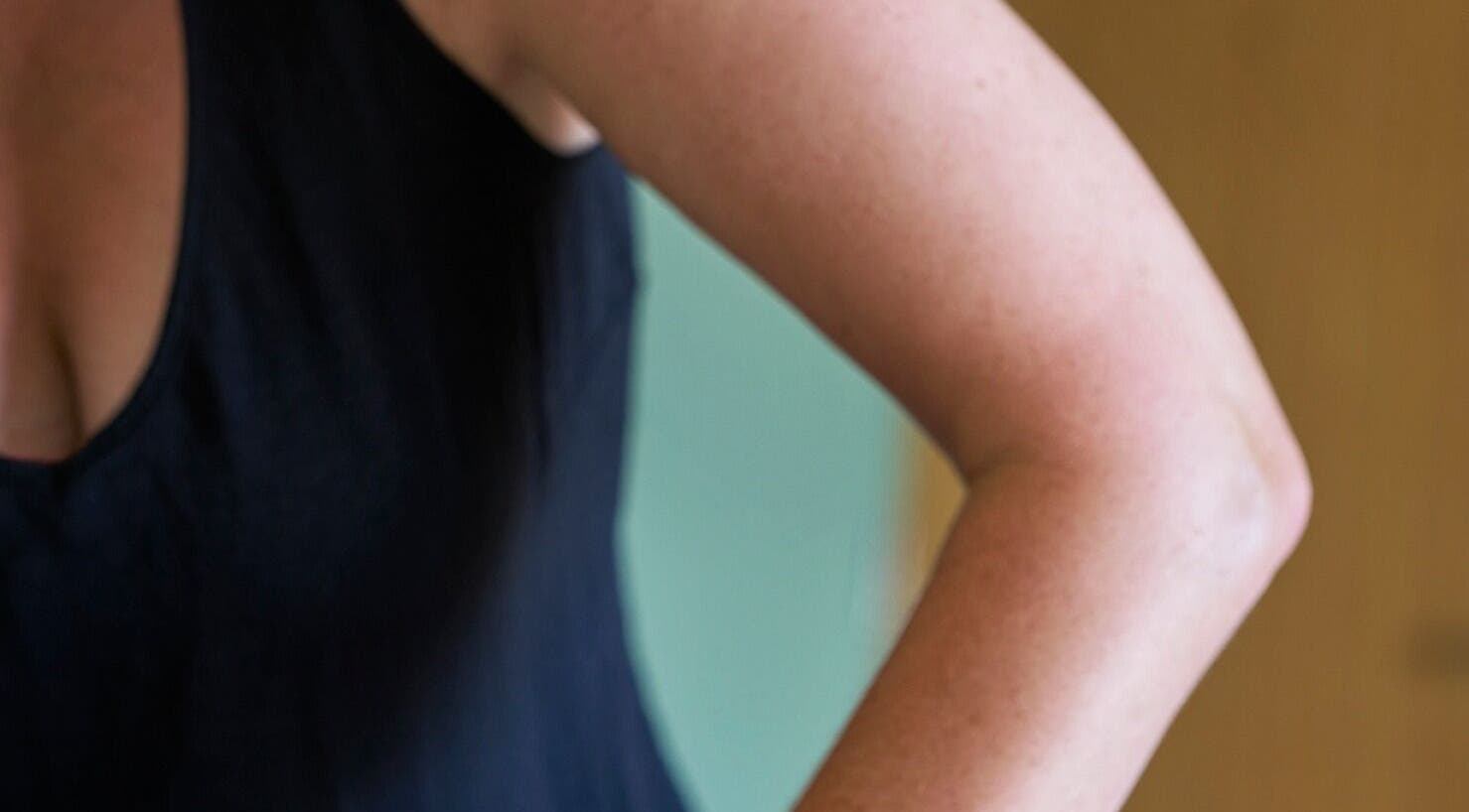 Side view of a relaxed arm in a serene setting at Thrive Therapies, Bideford, England, GB.