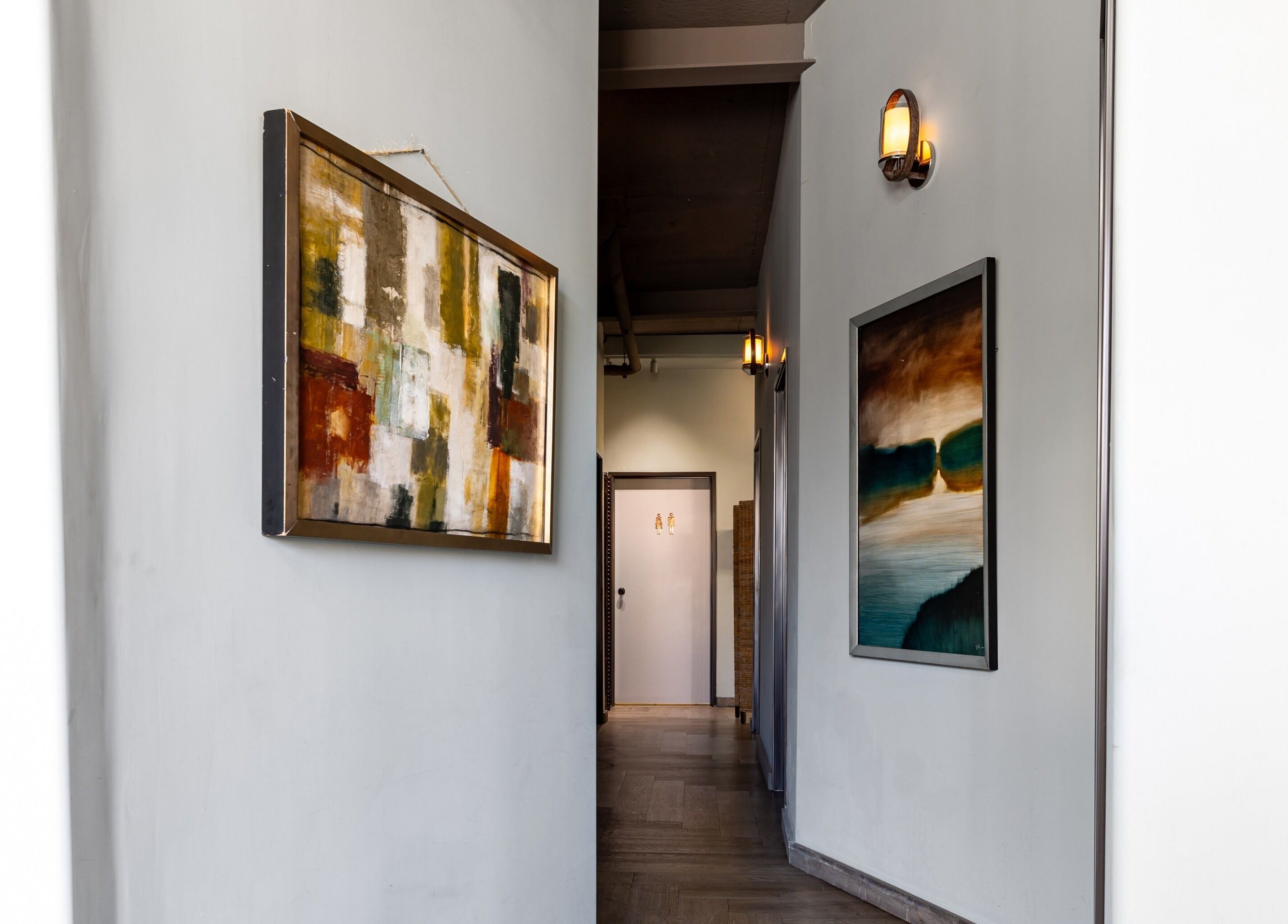 Elegant hallway with art at Pure Skin Science Organic Lab and Spa, San Clemente, California, US.