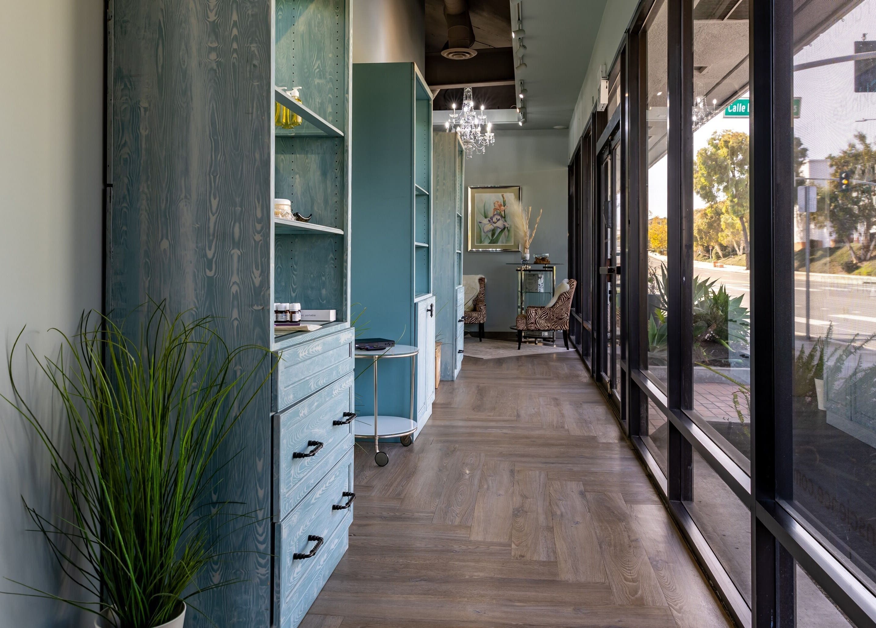 Elegant spa hallway at Pure Skin Science Organic Lab and Spa, San Clemente, California with natural lighting.