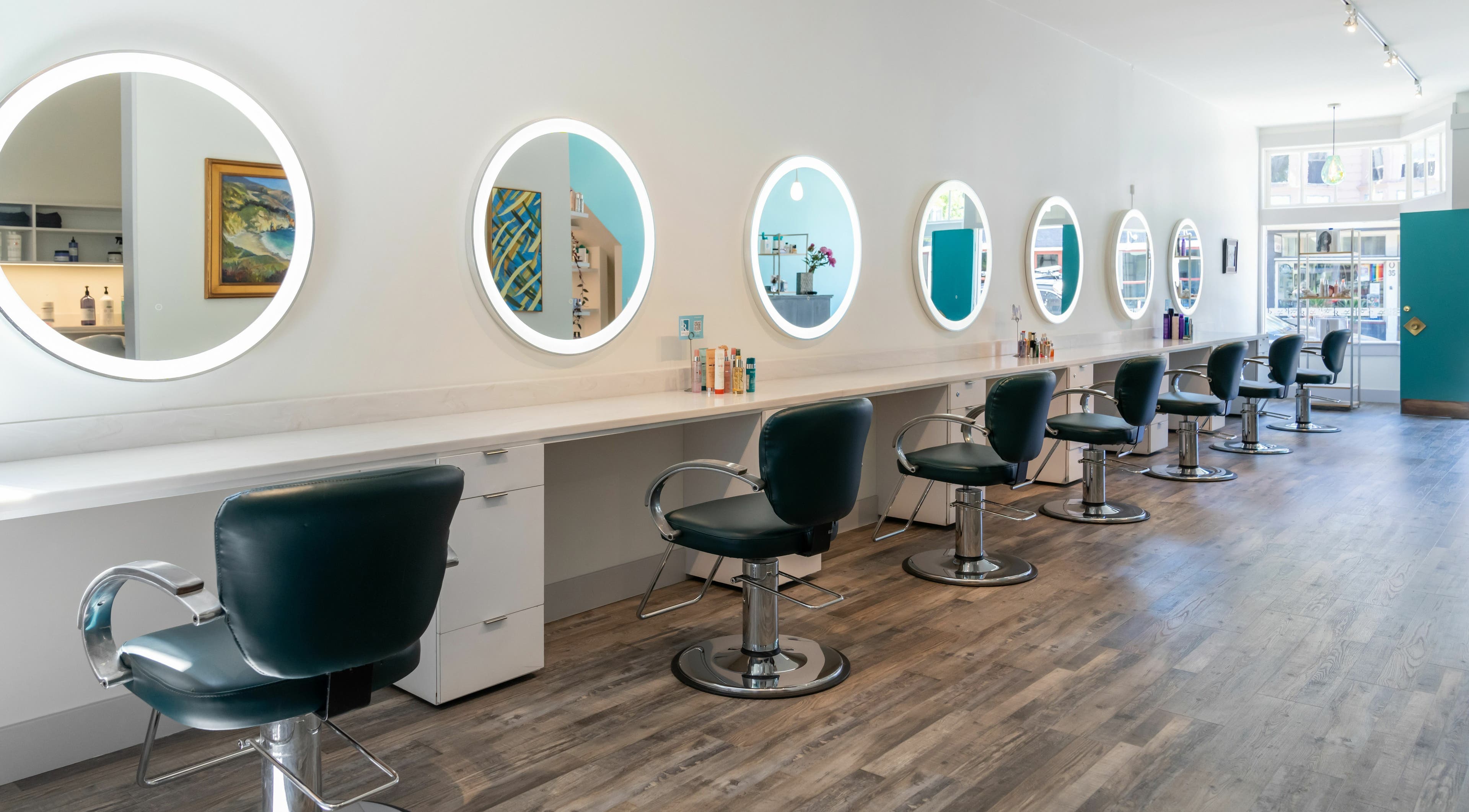 Interior of J. Roland Salon Sausalito, Sausalito, California, US, featuring modern styling chairs and mirrors.