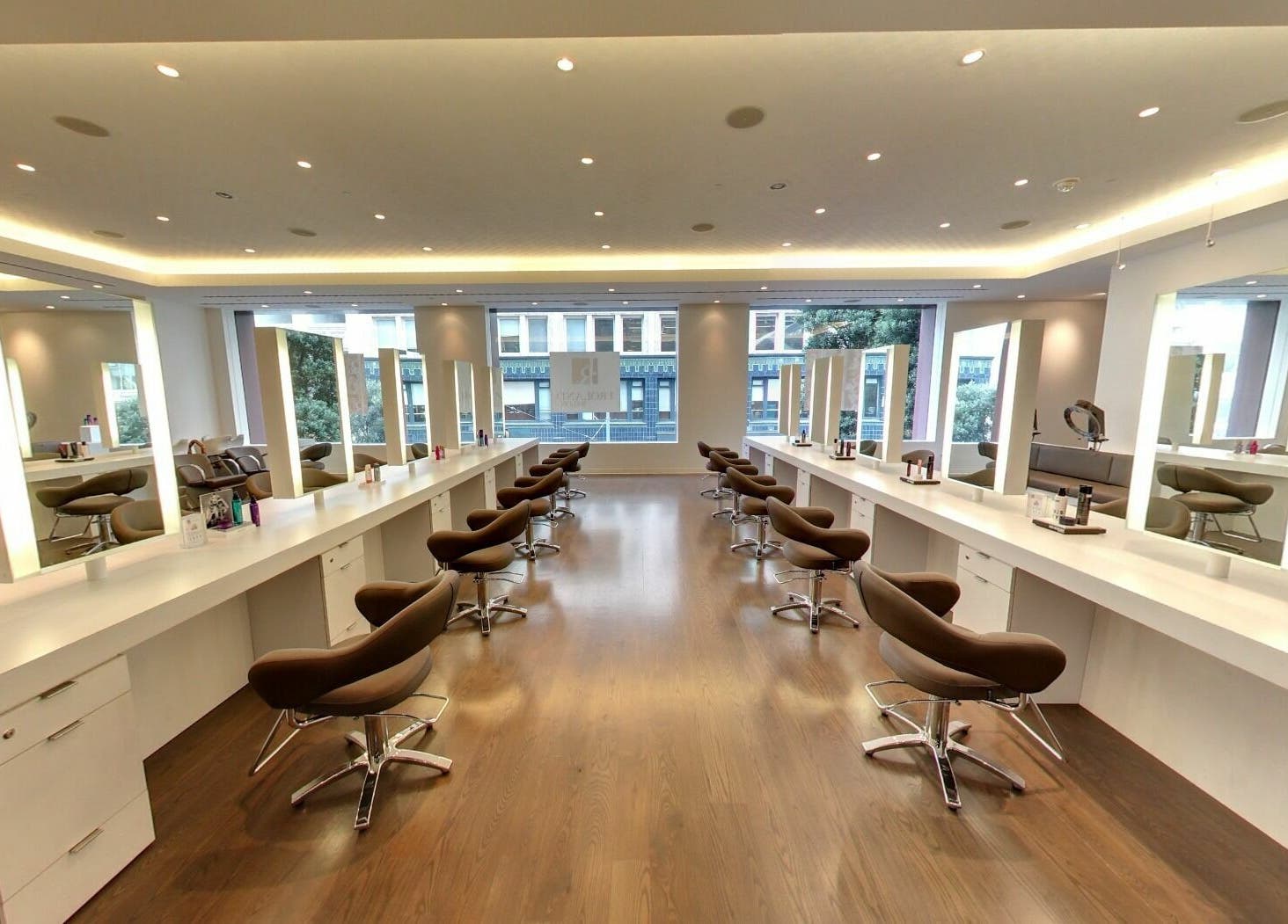 Sleek interior of Angela Chong-Montague (J. Roland Salon), San Francisco, California, US, featuring modern styling chairs.