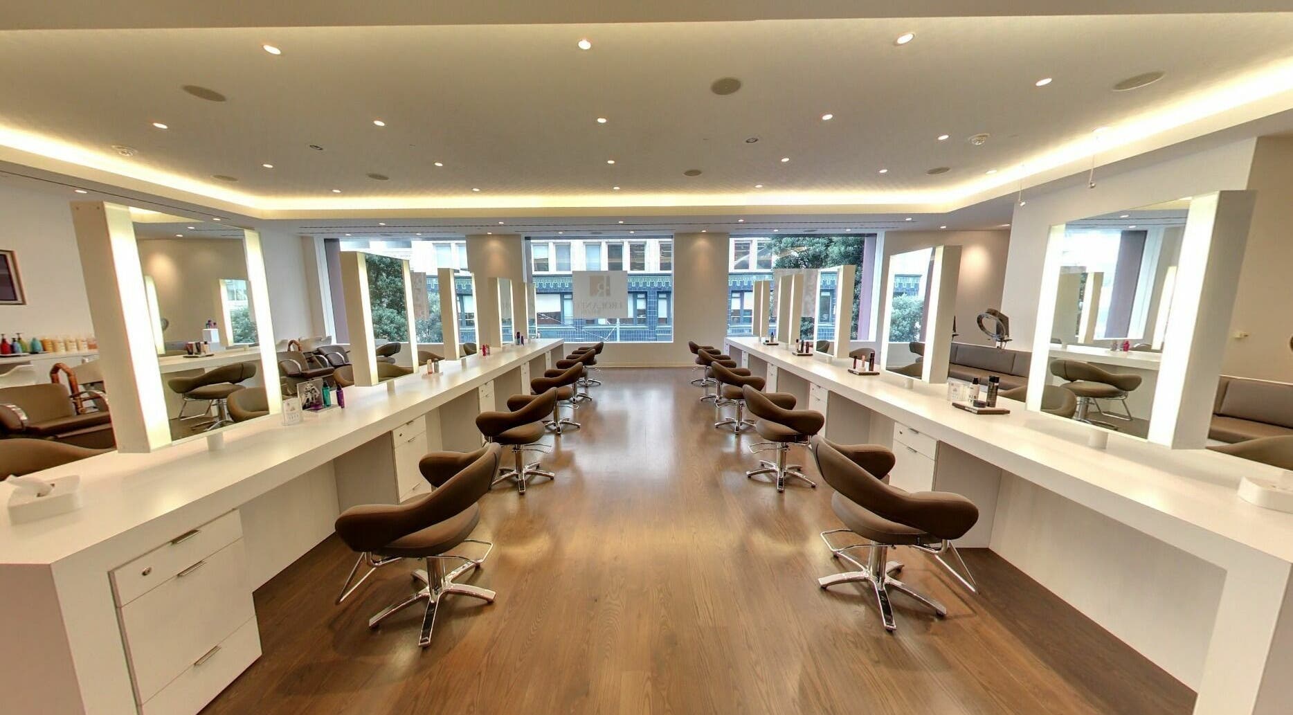 Sleek interior of Angela Chong-Montague (J. Roland Salon), San Francisco, California, US, featuring modern styling chairs.