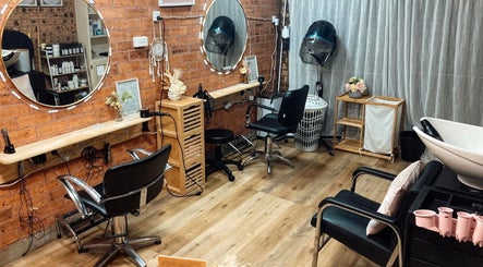 Elegant salon interior at JLC Couture Artistry, Werrington, New South Wales, AU, featuring modern styling chairs.
